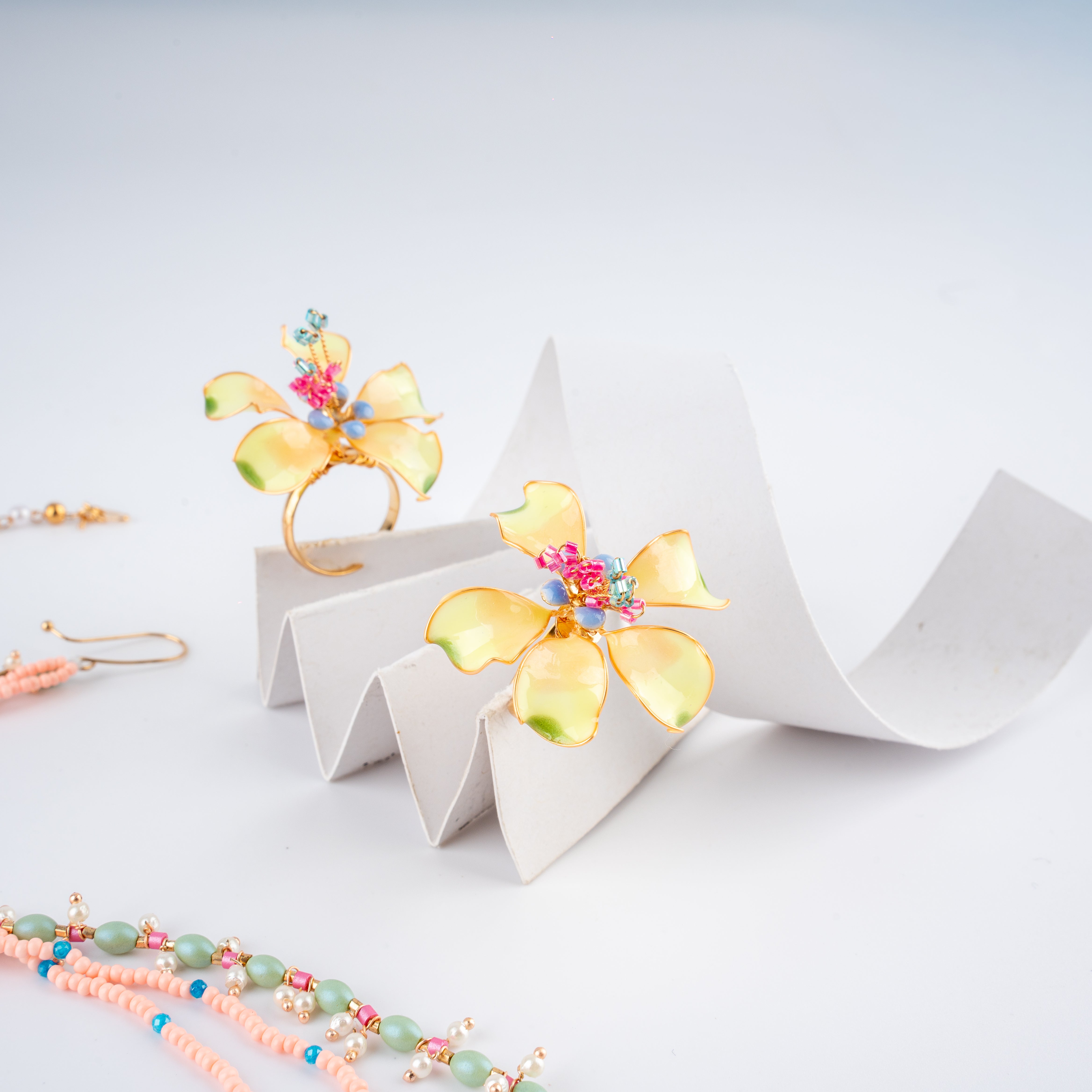 The Sunshine Marigold Floral Resin Art Jewelry Set with Beaded Ear Chains