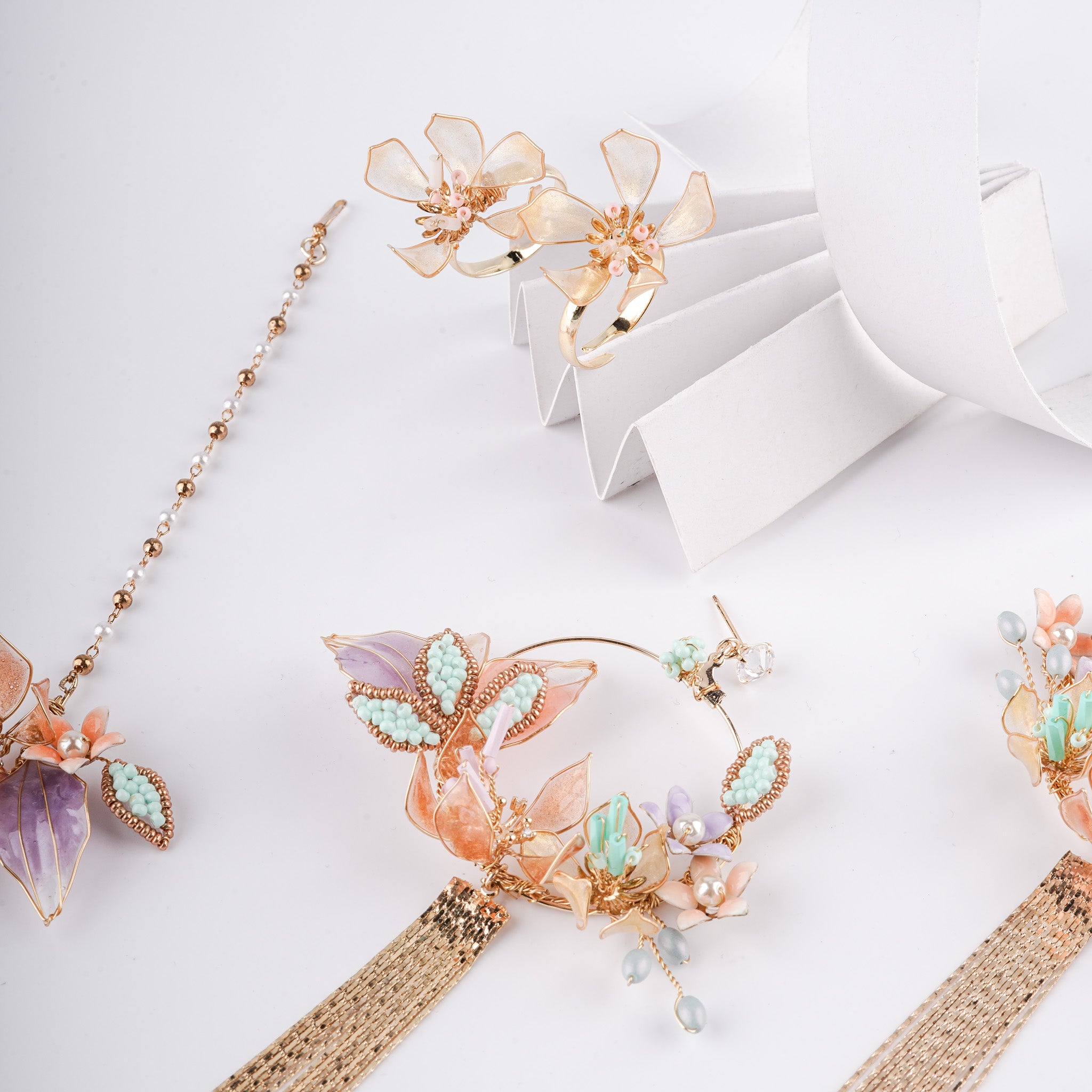 The Pastel Mirage Floral Resin Art Jewelry Set with Tassel Earrings