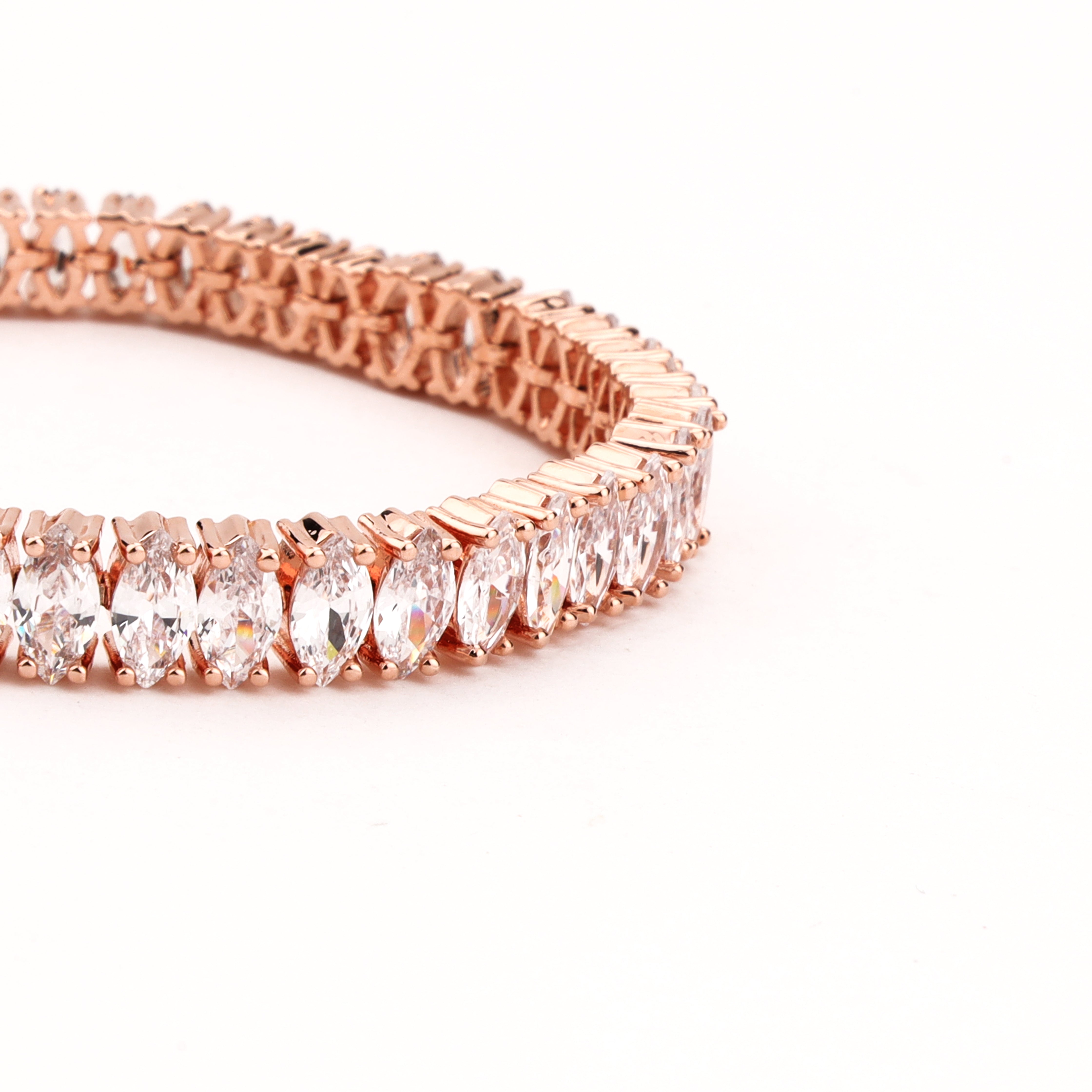 Elara rose-gold-tone tennis bracelet with a continuous row of faceted clear marquise crystal stones