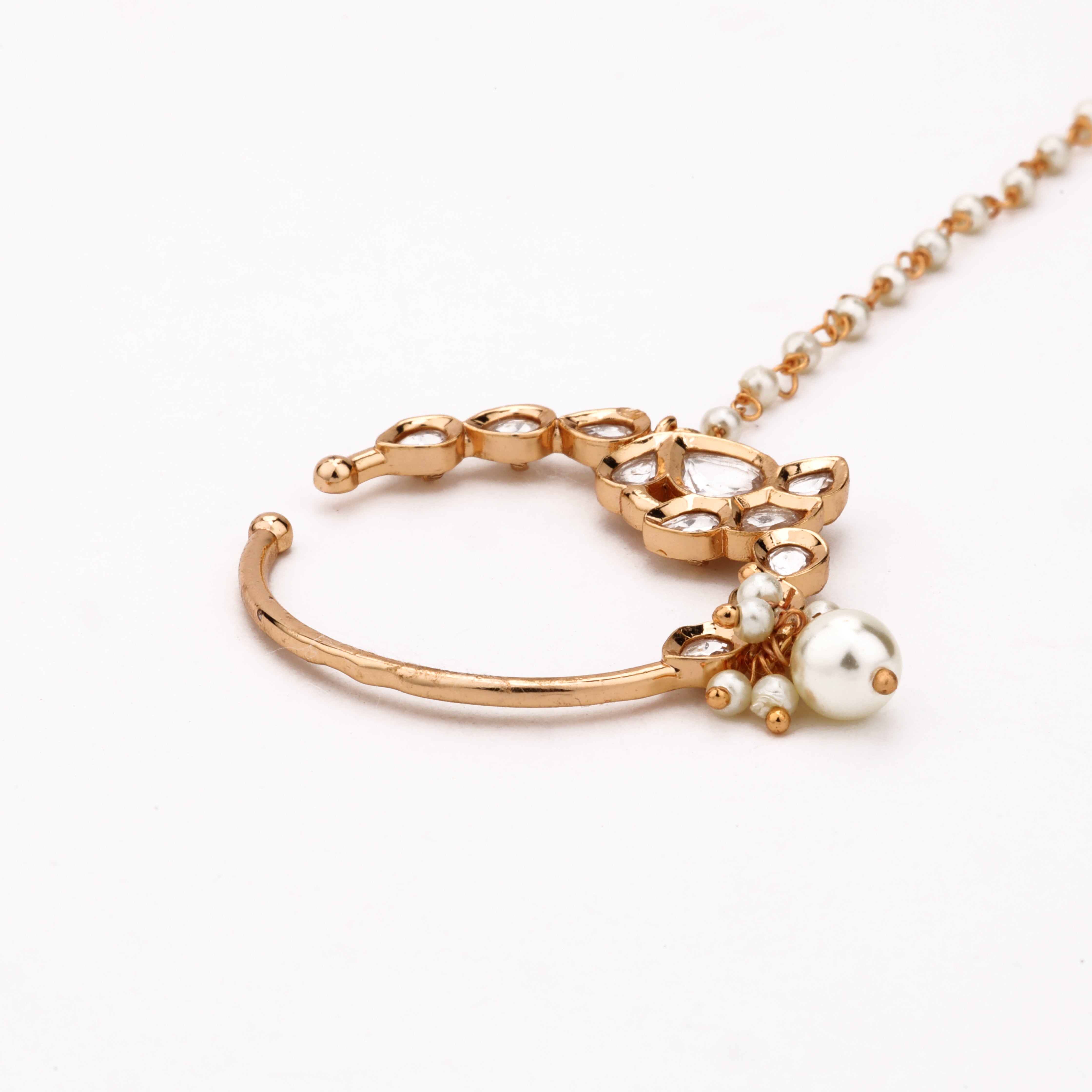Rose gold Roshika leaf cascade polki pearl nath with teardrop stones, pearl drop and attached beaded chain from US Catalog