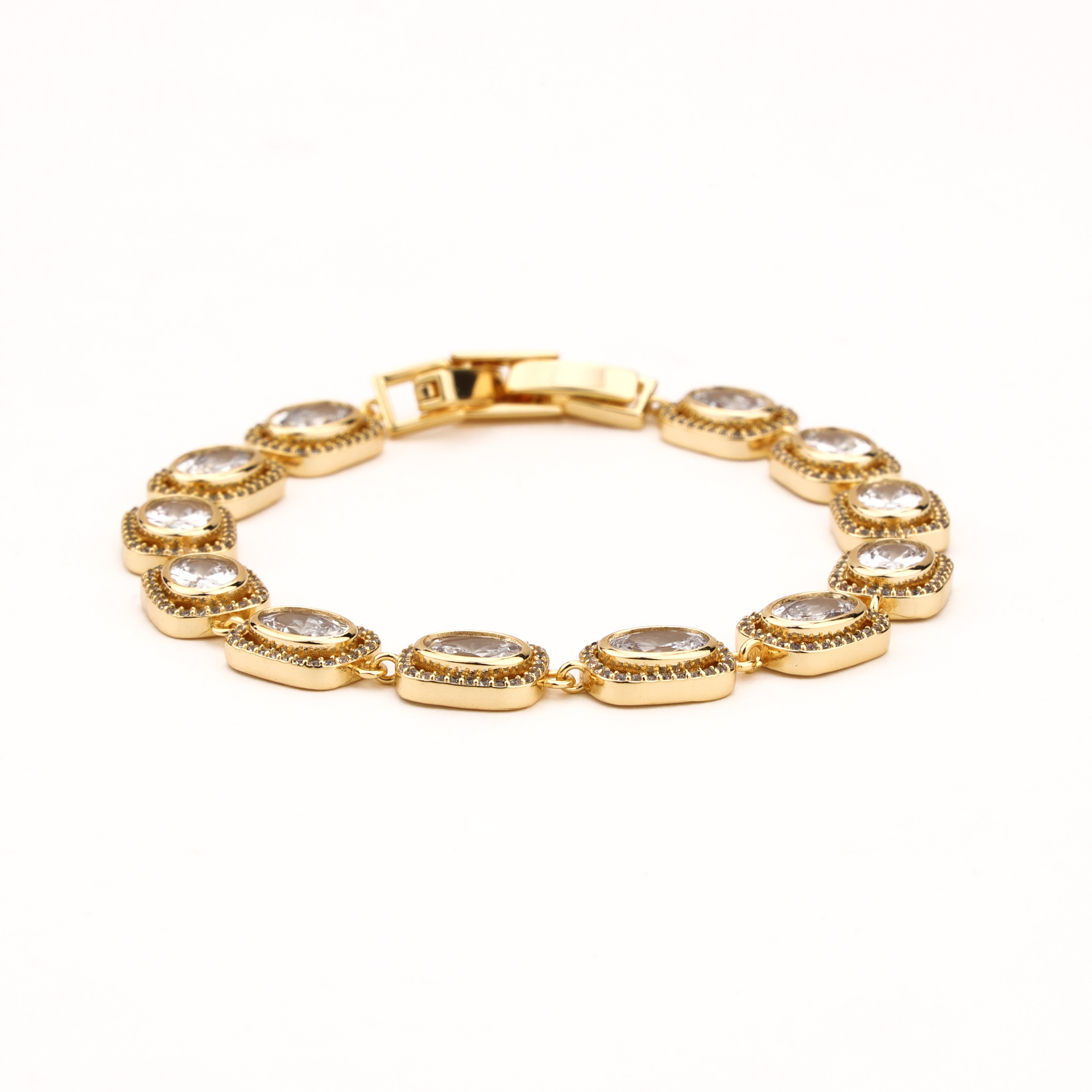 Aveline gold-tone bracelet with oval clear crystals, sparkling halo borders and linked settings