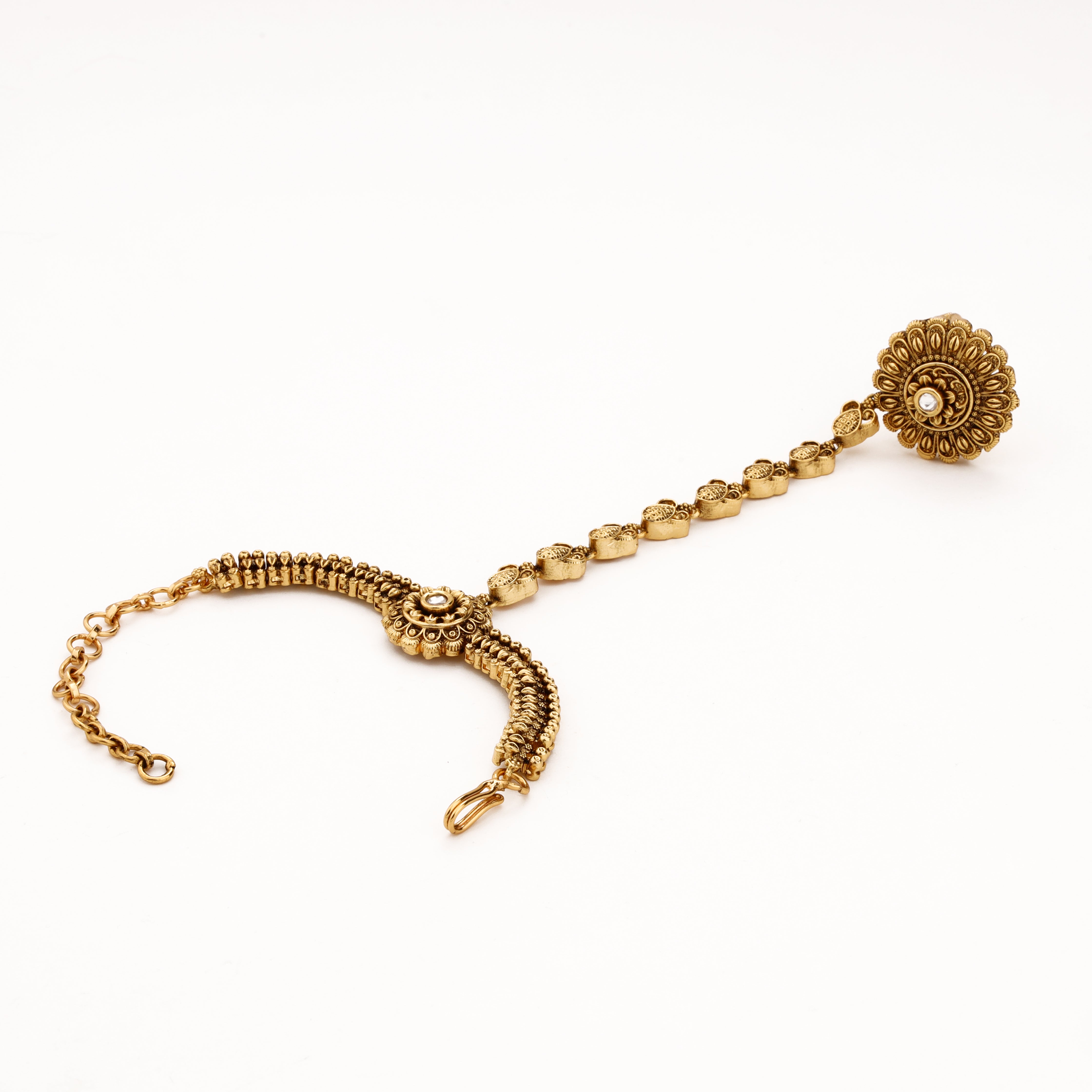 Antique gold floral filigree pocha with statement ring, decorative hand chain and adjustable wrist closure