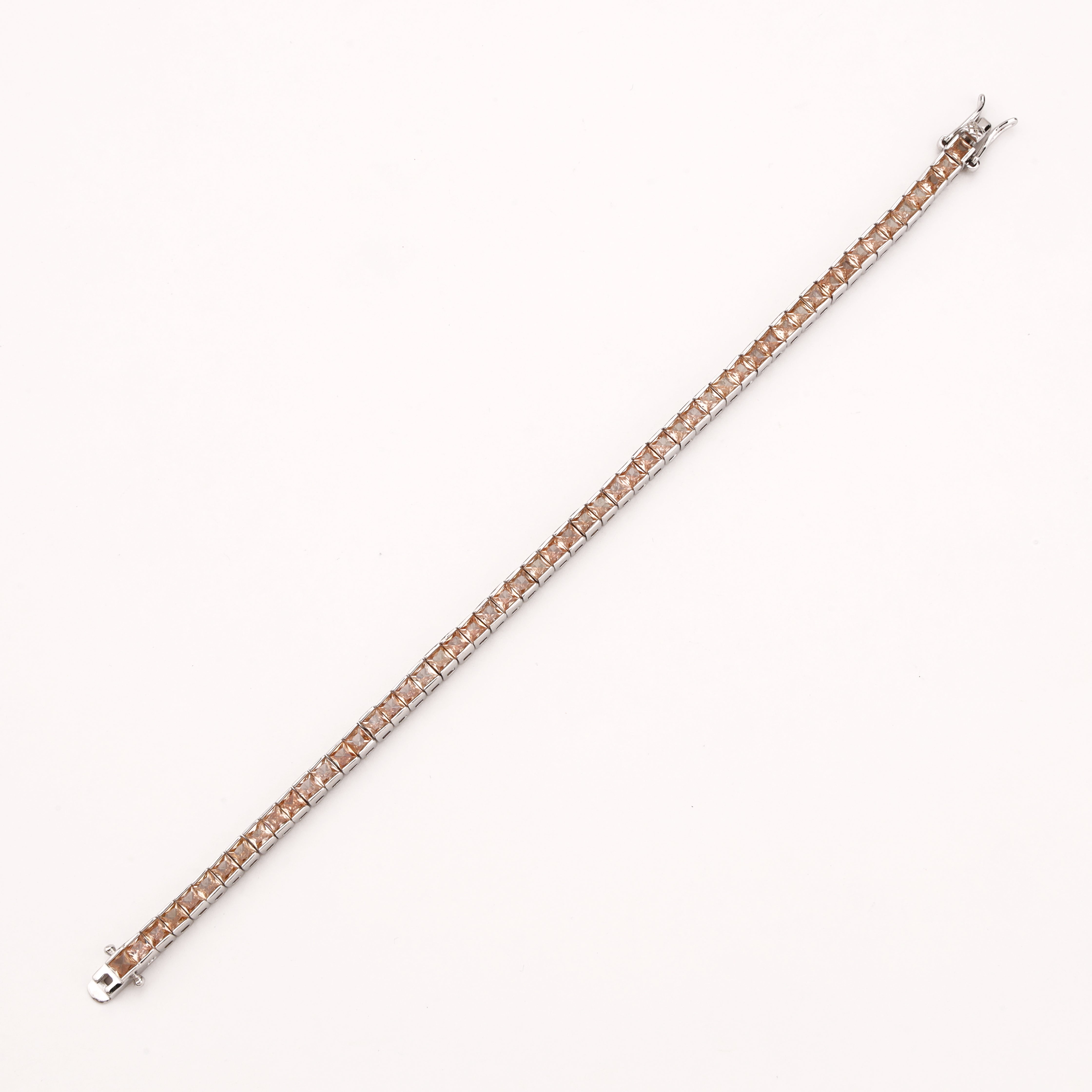 Serenna silver-tone tennis bracelet with champagne square-cut crystal stones in sleek linked settings