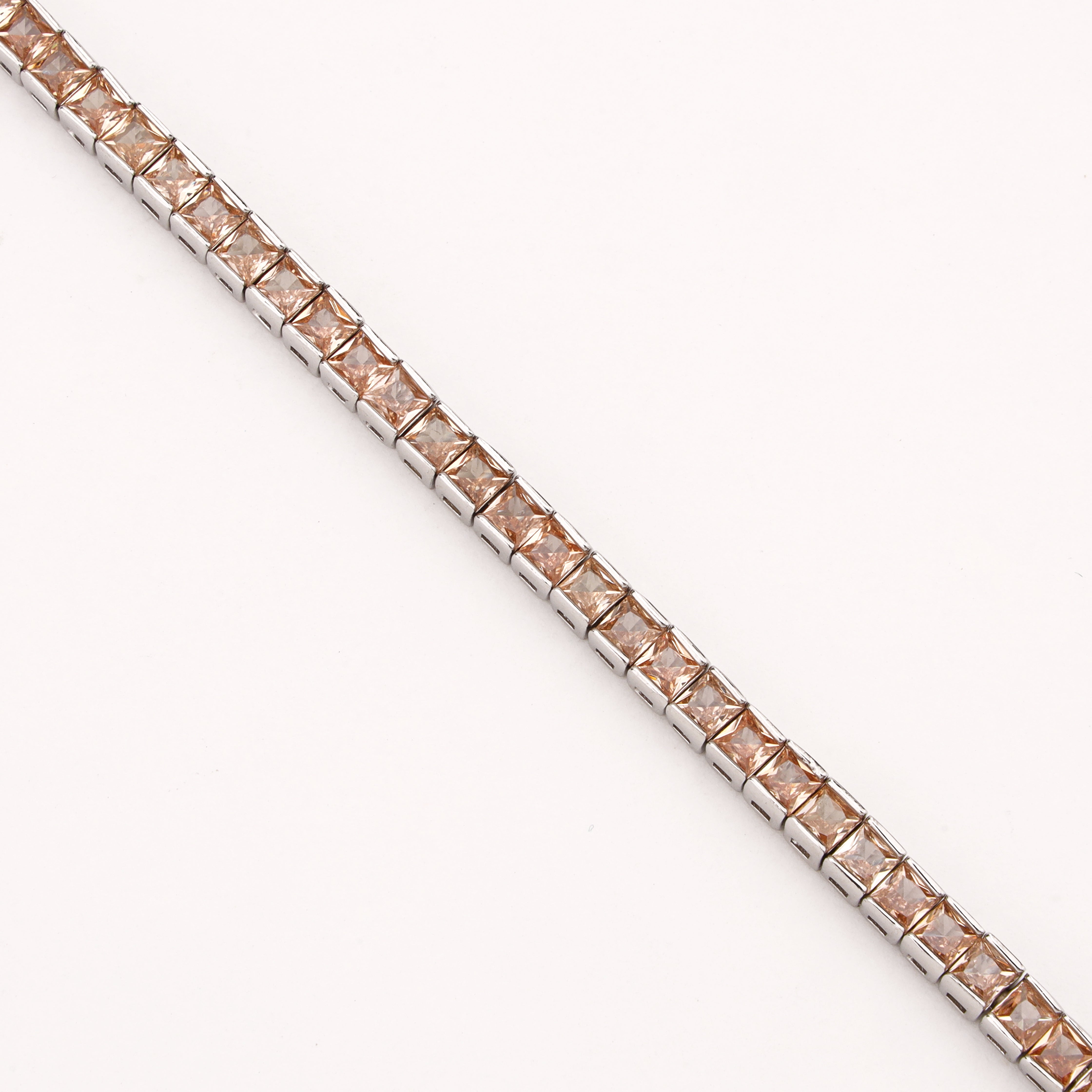 Serenna silver-tone tennis bracelet with champagne square-cut crystal stones in sleek linked settings