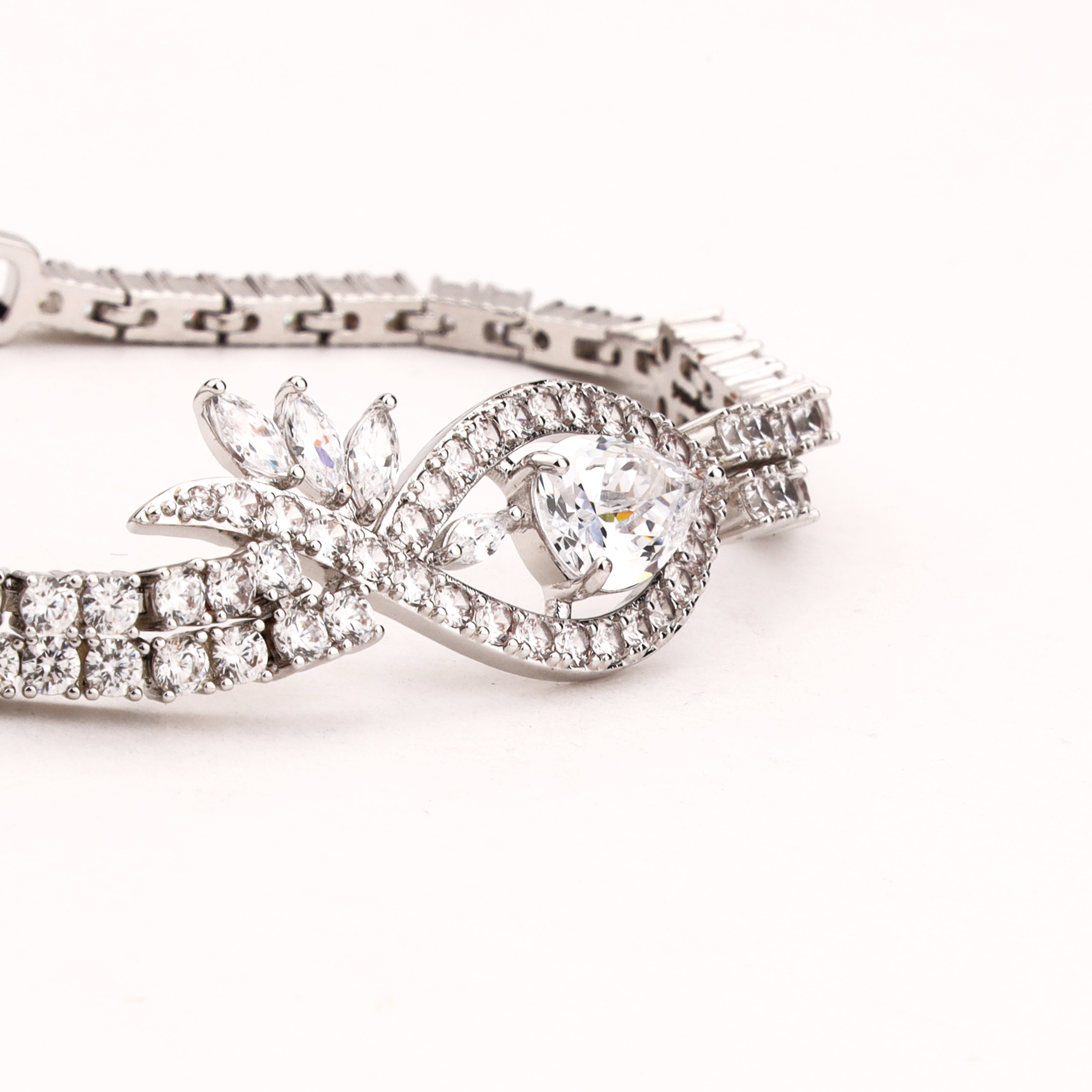 Evanthe silver-tone crystal bracelet with pear-shaped centre stone, marquise leaf accents and double-row sparkling links