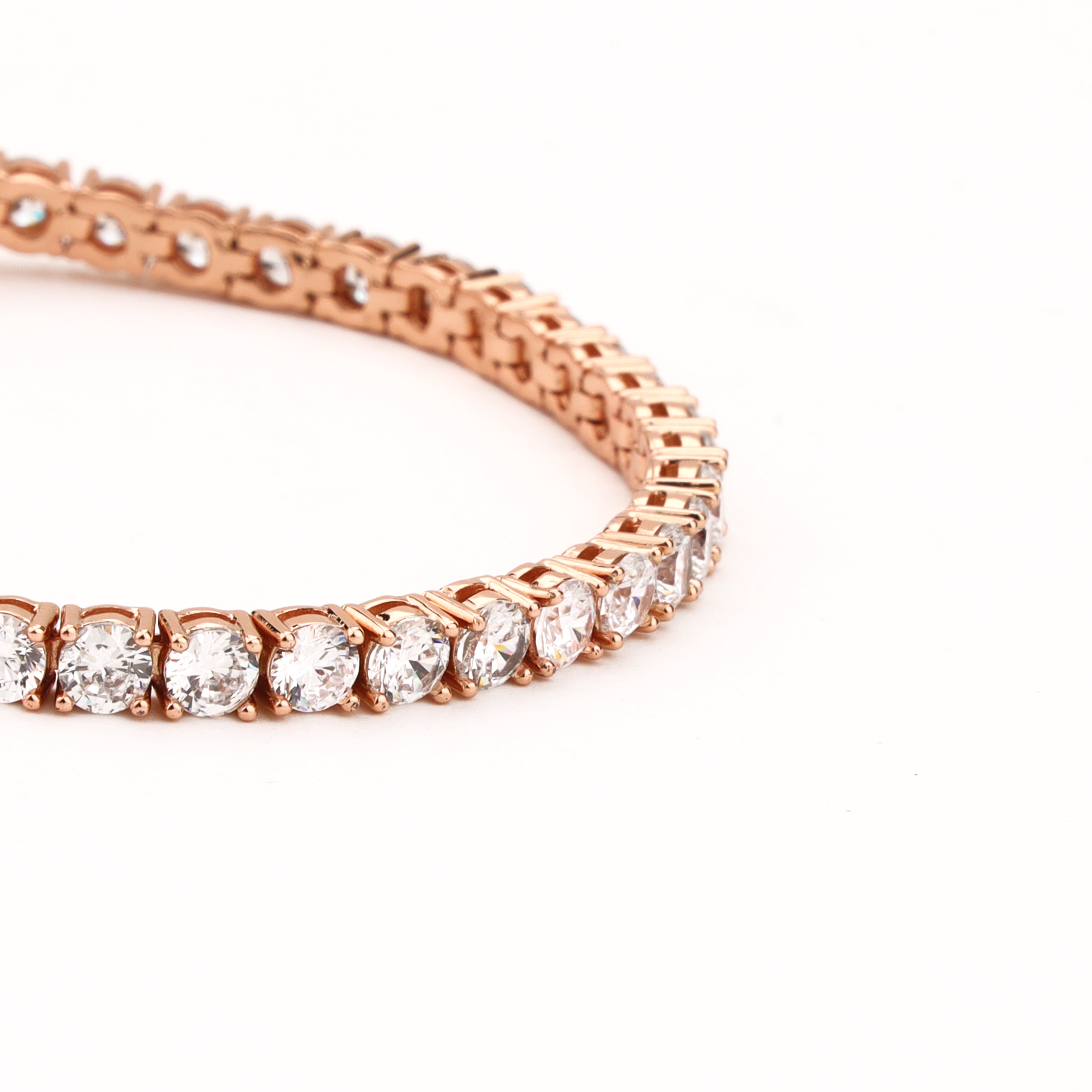 Celestine rose-gold-tone tennis bracelet with a continuous row of round clear crystal stones