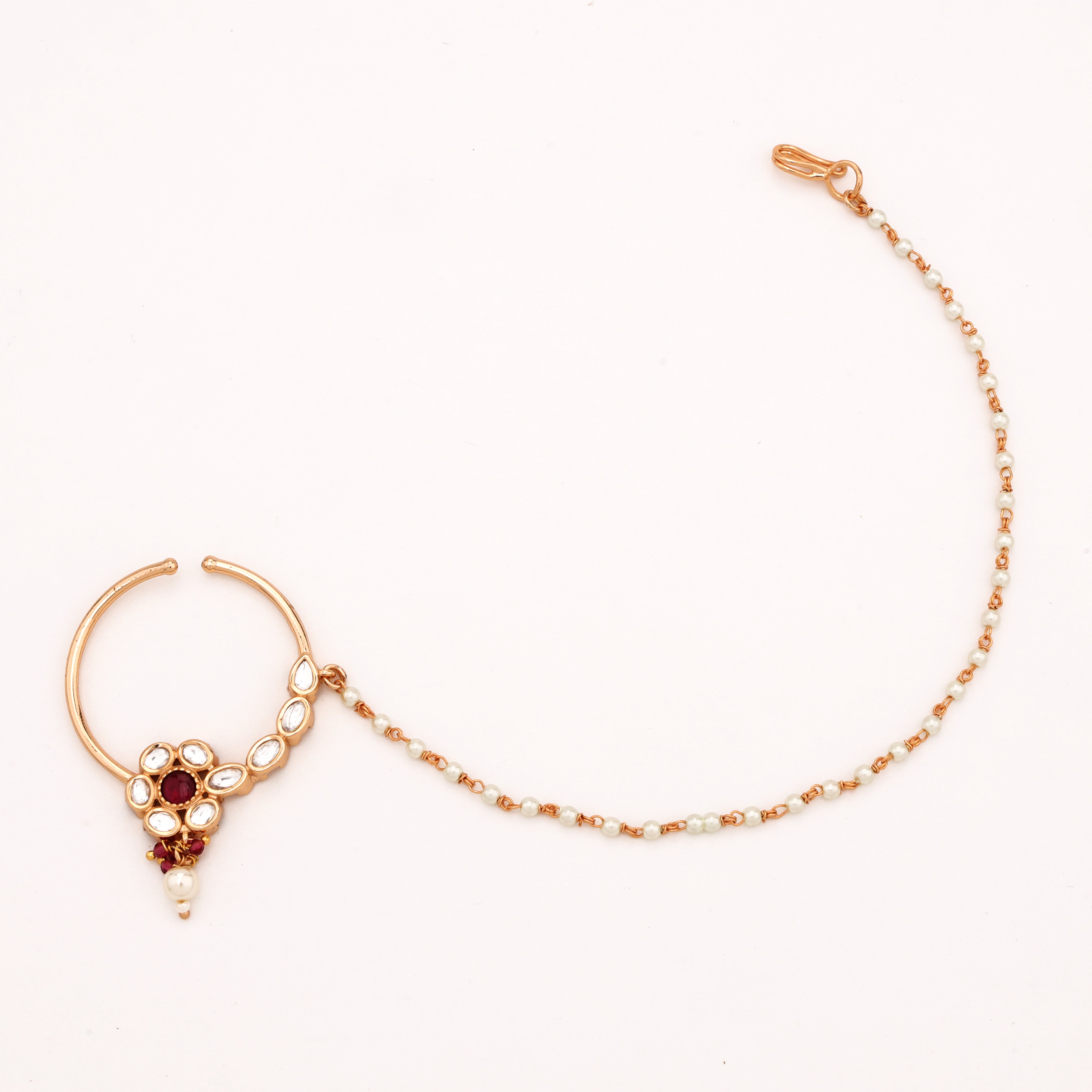 Ruby Bloom rose gold kundan pearl nath with ruby-red centre and attached beaded chain from US Catalog