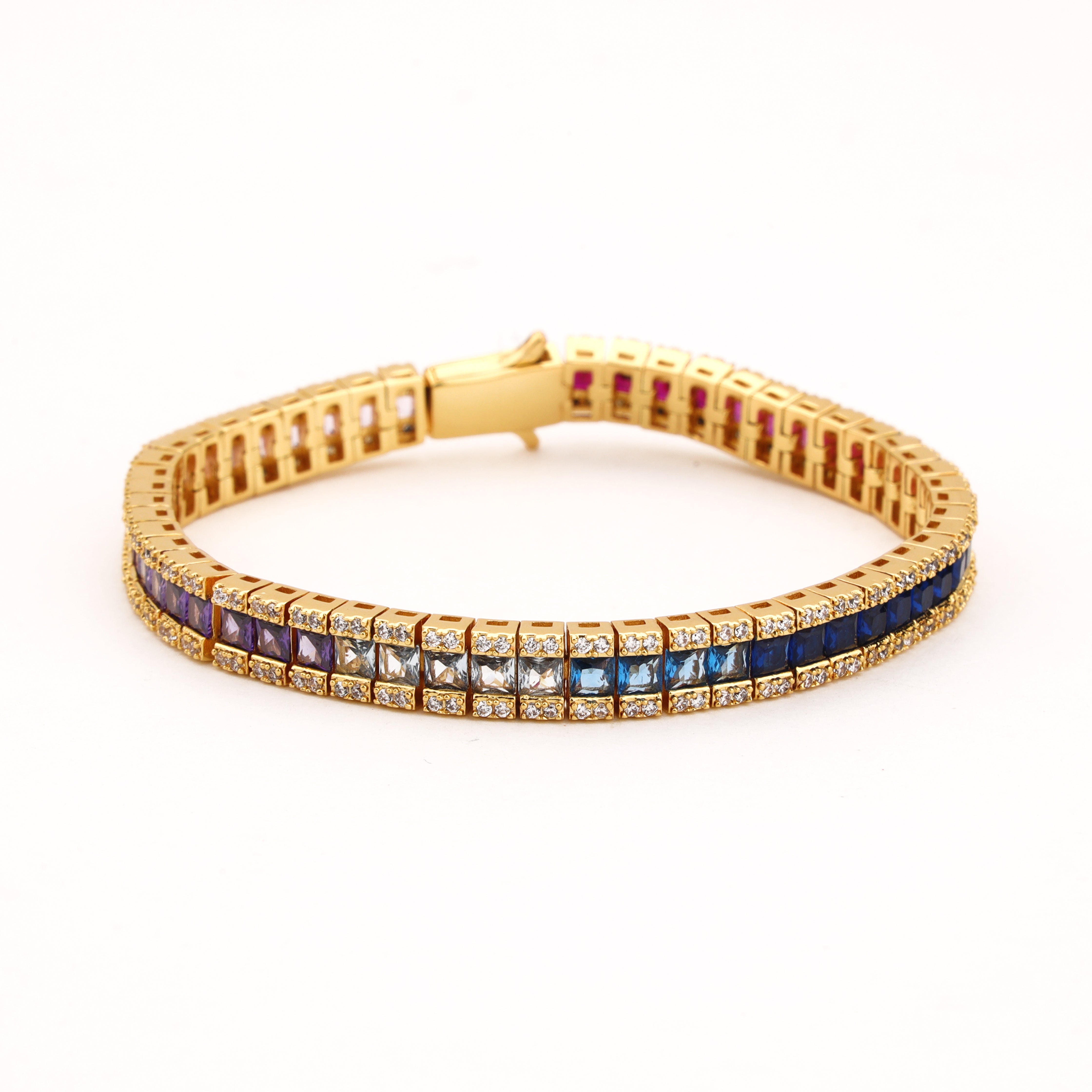 Rainbow gold-tone ombre crystal bracelet with purple, clear, aqua and deep blue square stones