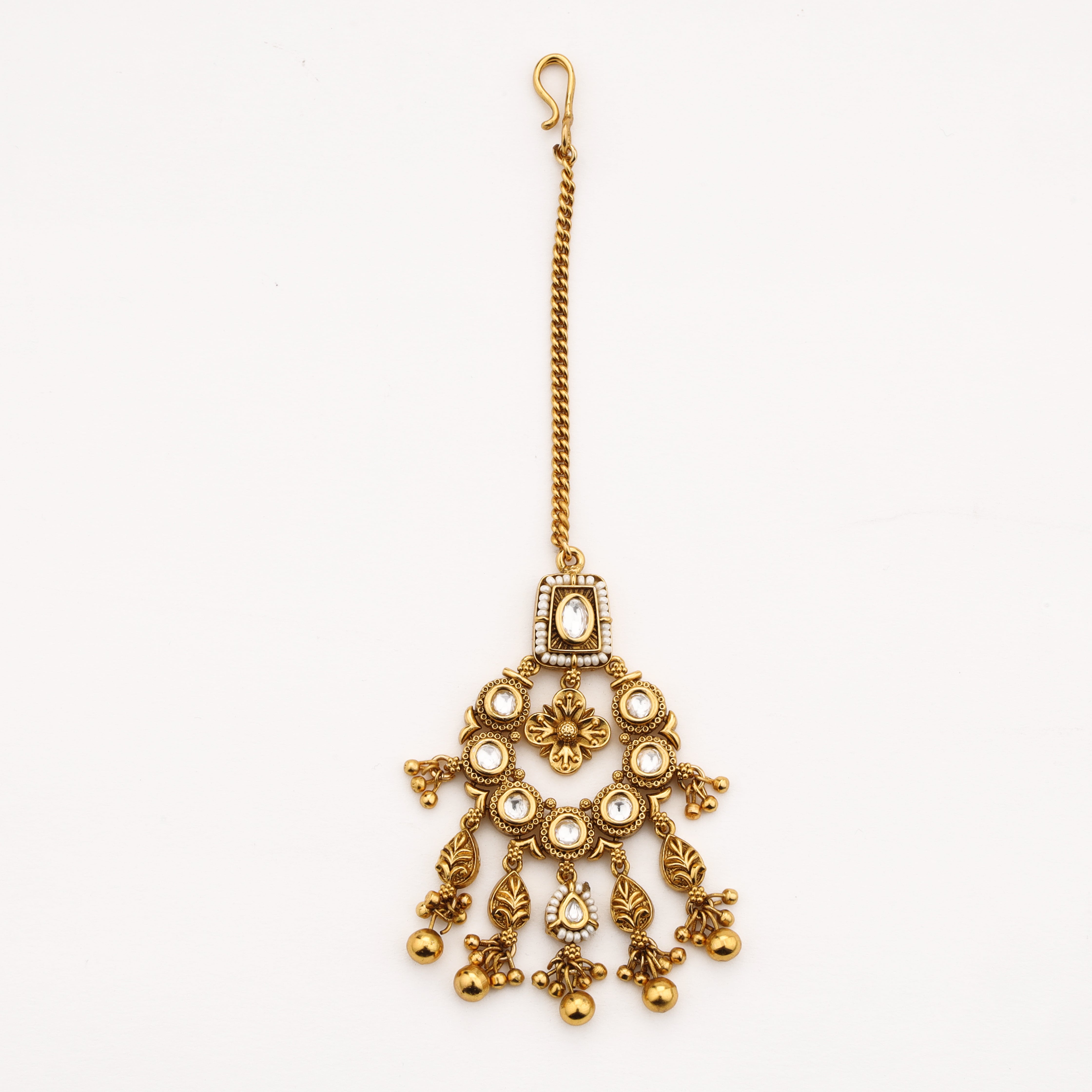 Diamond antique gold Maang Tika with pearl accents and hanging charms by US Catalog