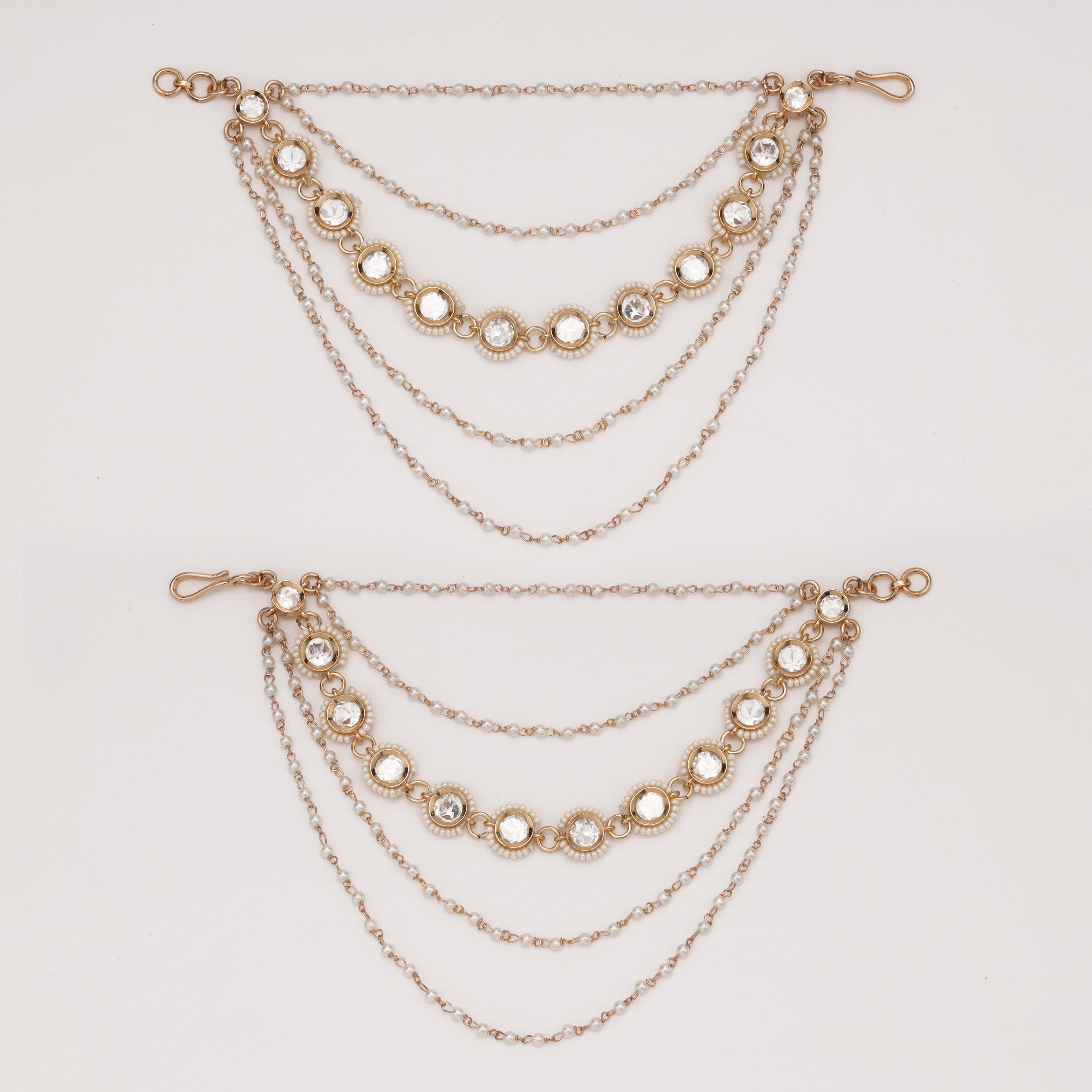 Pearl Halo Layered Ear Chain with crystal halo motifs and layered pearl chains by US Catalog