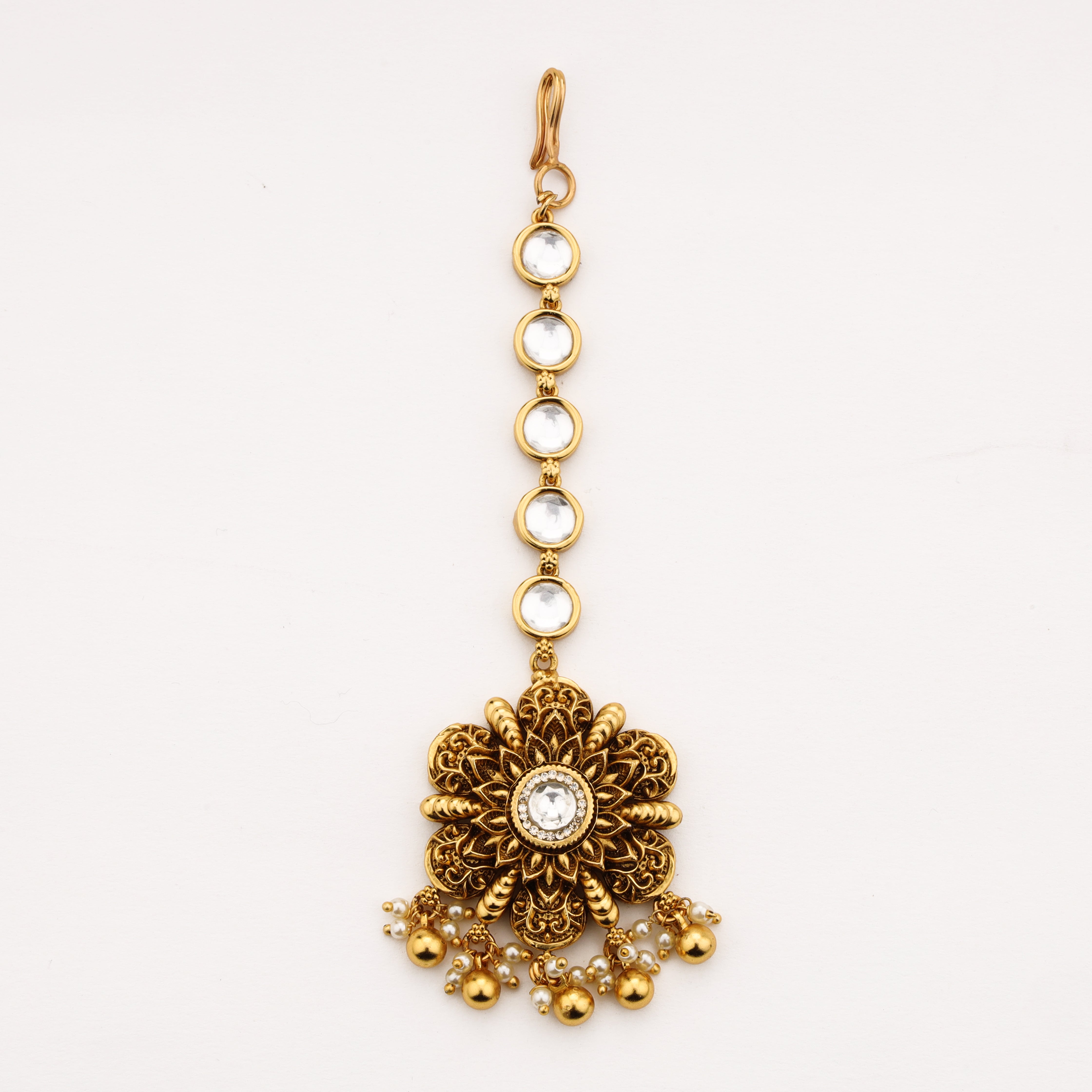 Diamond floral Maang Tika in antique gold finish with pearl tassels by US Catalog