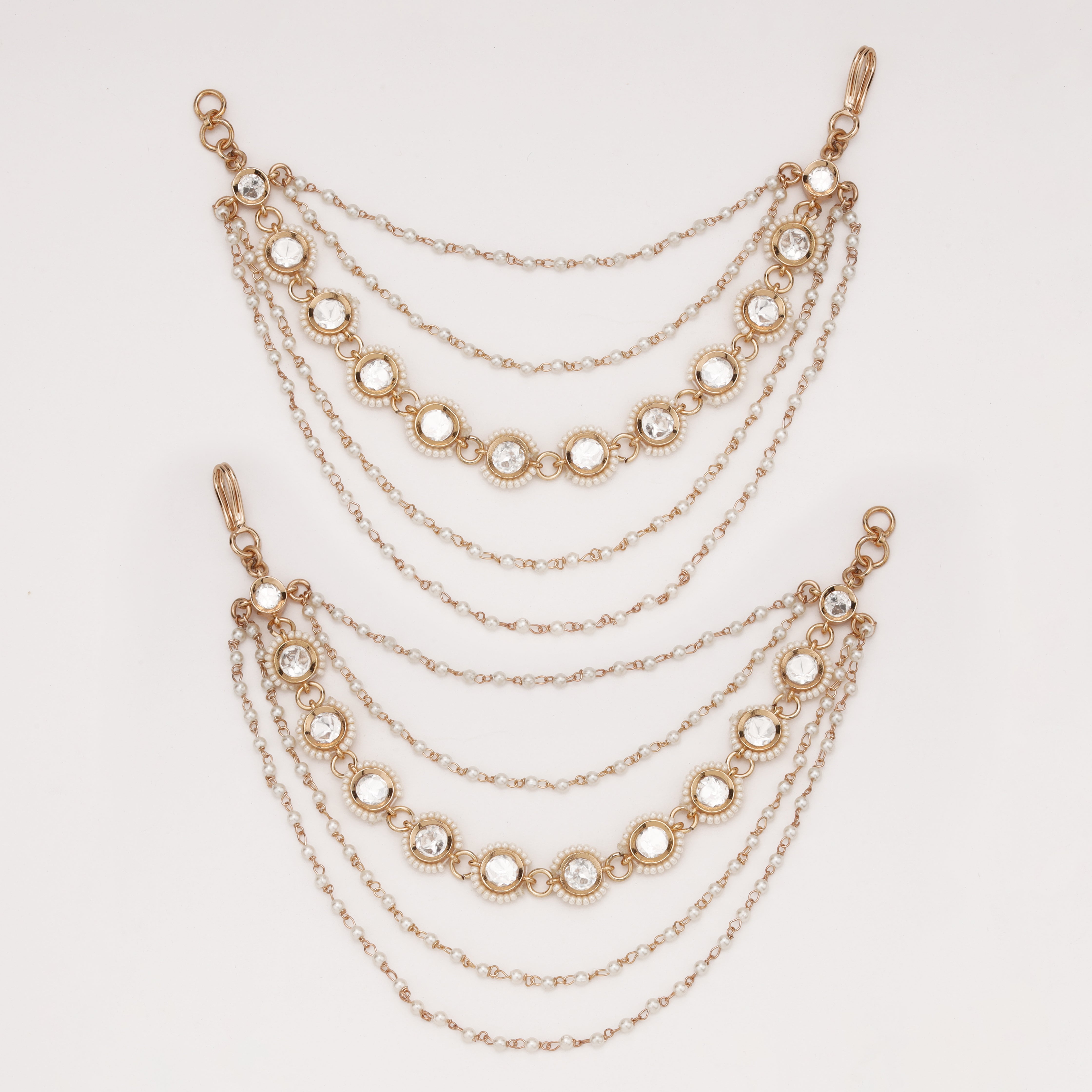 Pearl Halo Layered Ear Chain with crystal halo motifs and layered pearl chains by US Catalog