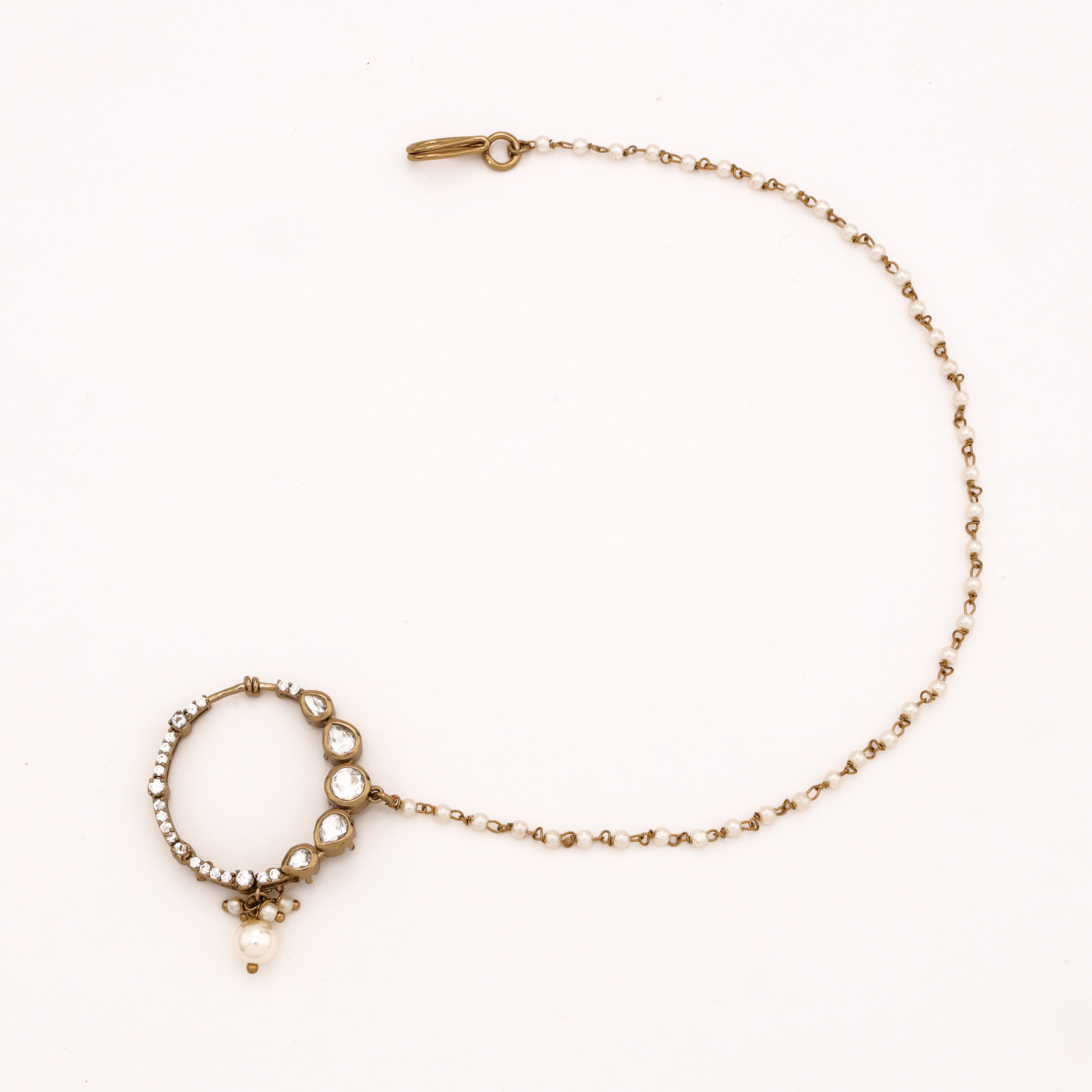 Antique gold Aurelia polki pearl nath with white stones, pearl drop and attached beaded chain from US Catalog