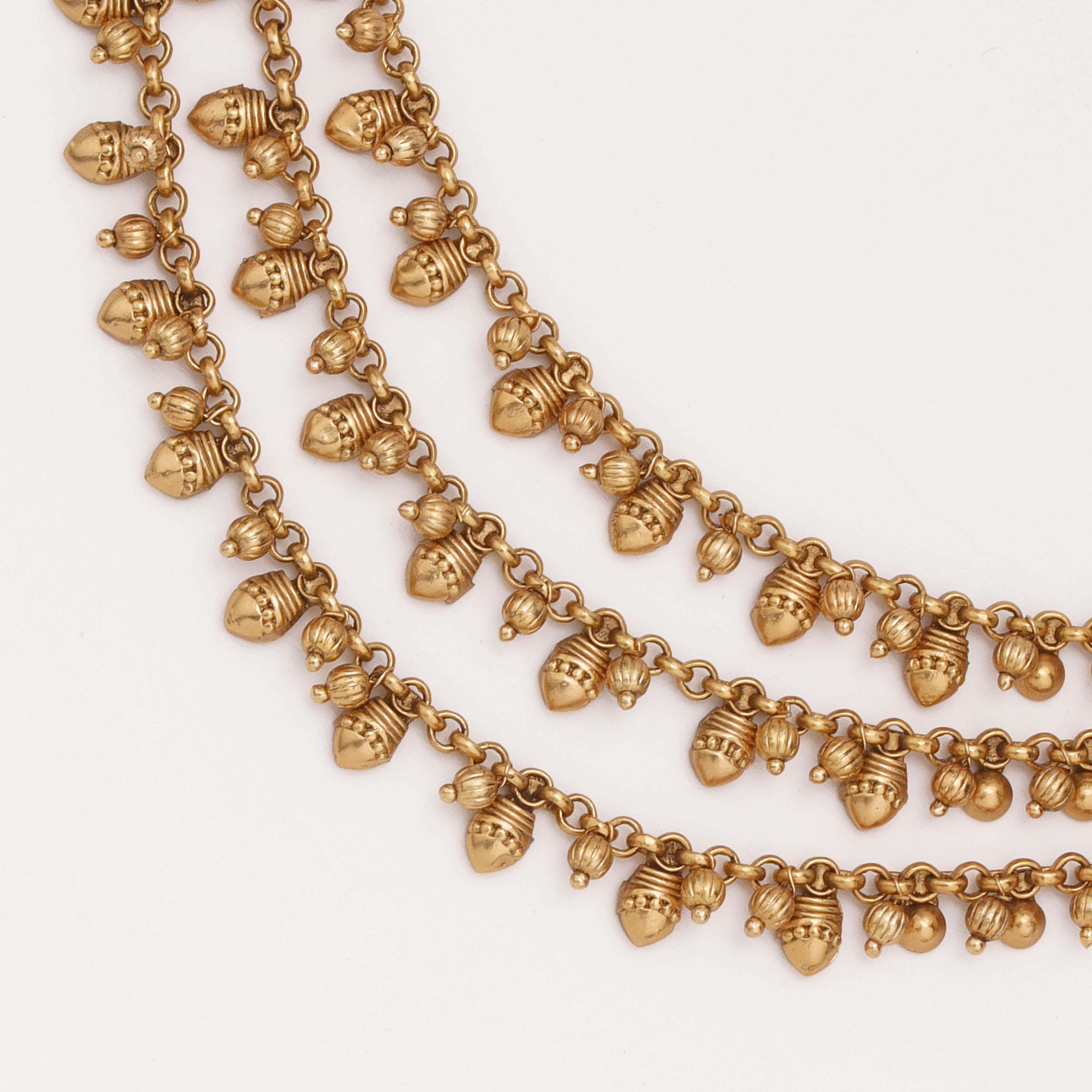 Heritage Ghungroo Layered Ear Chain with traditional antique gold detailing by US Catalog