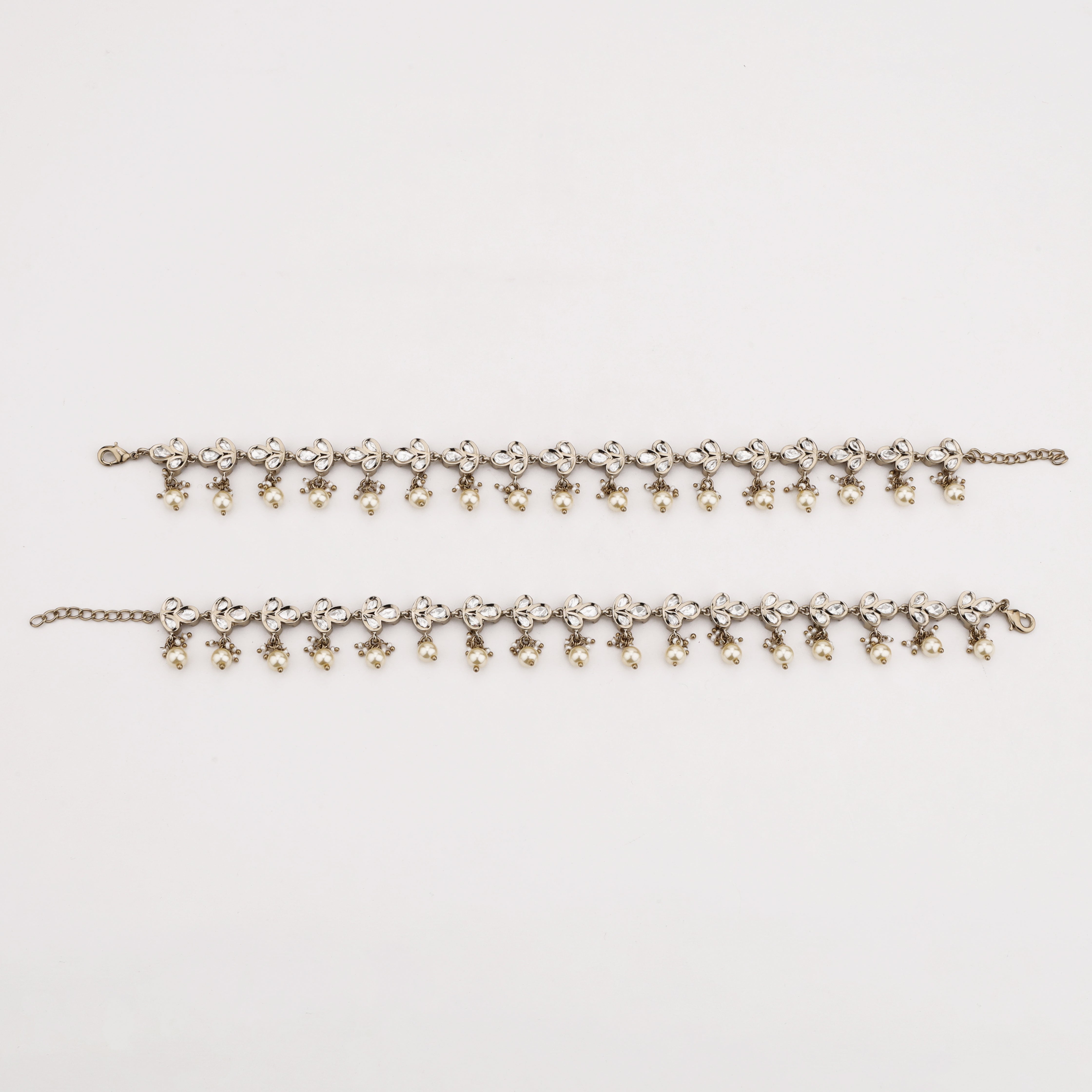 Pearl Petal Crystal Anklet with floral crystal motifs and pearl danglers by US Catalog