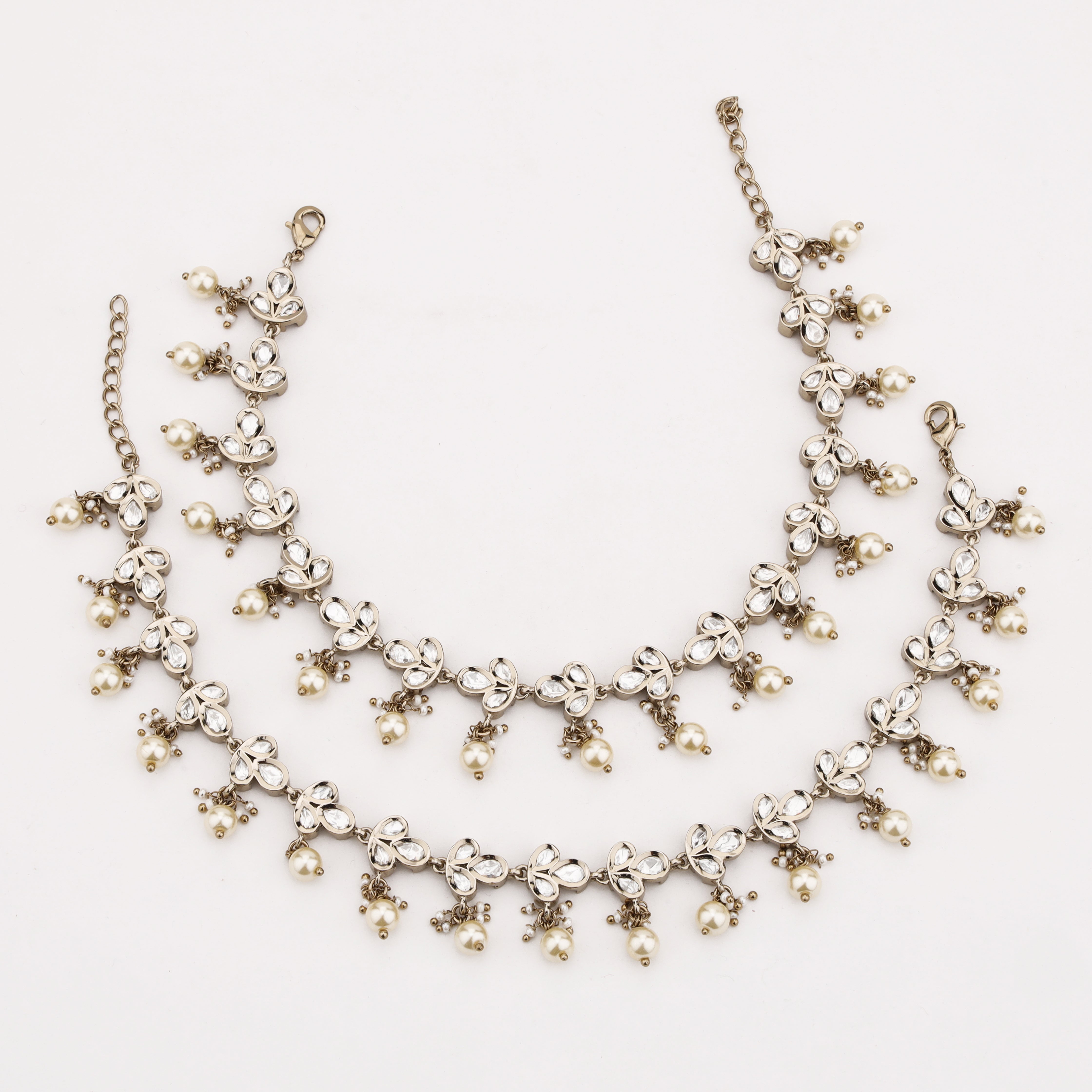 Pearl Petal Crystal Anklet with floral crystal motifs and pearl danglers by US Catalog