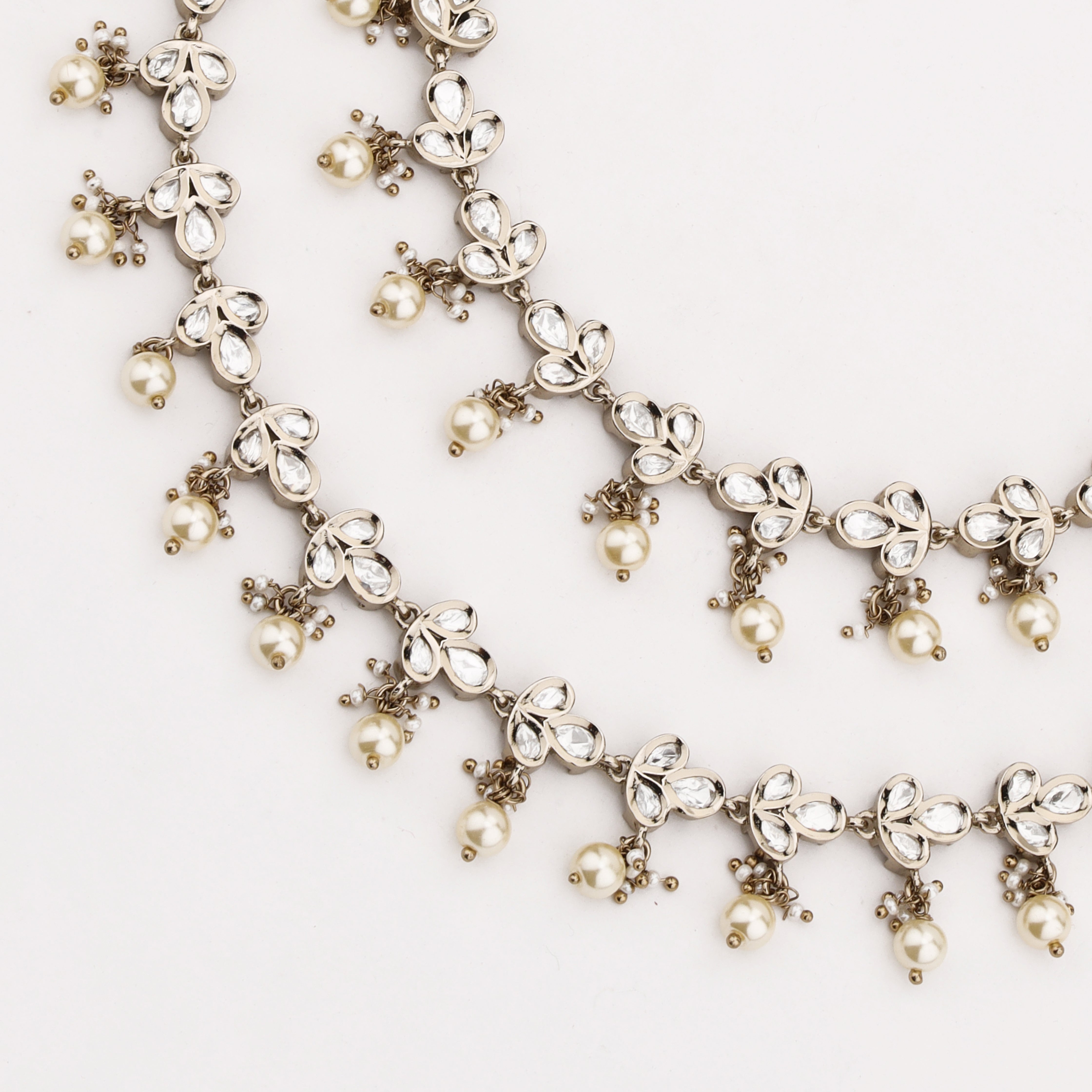 Pearl Petal Crystal Anklet with floral crystal motifs and pearl danglers by US Catalog