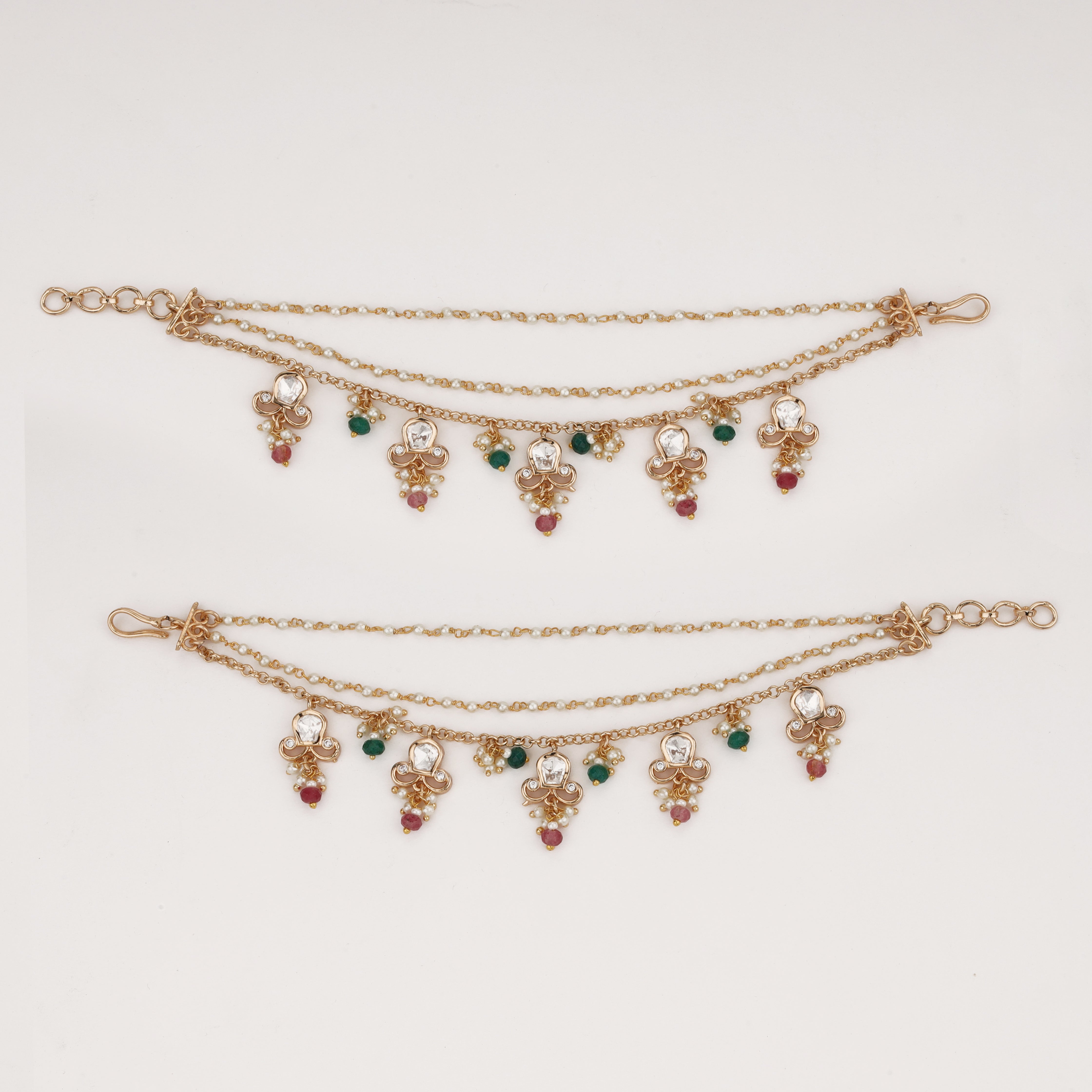 Regal multicolor charm ear chain with crystal motifs, pearl accents, and layered chains by US Catalog