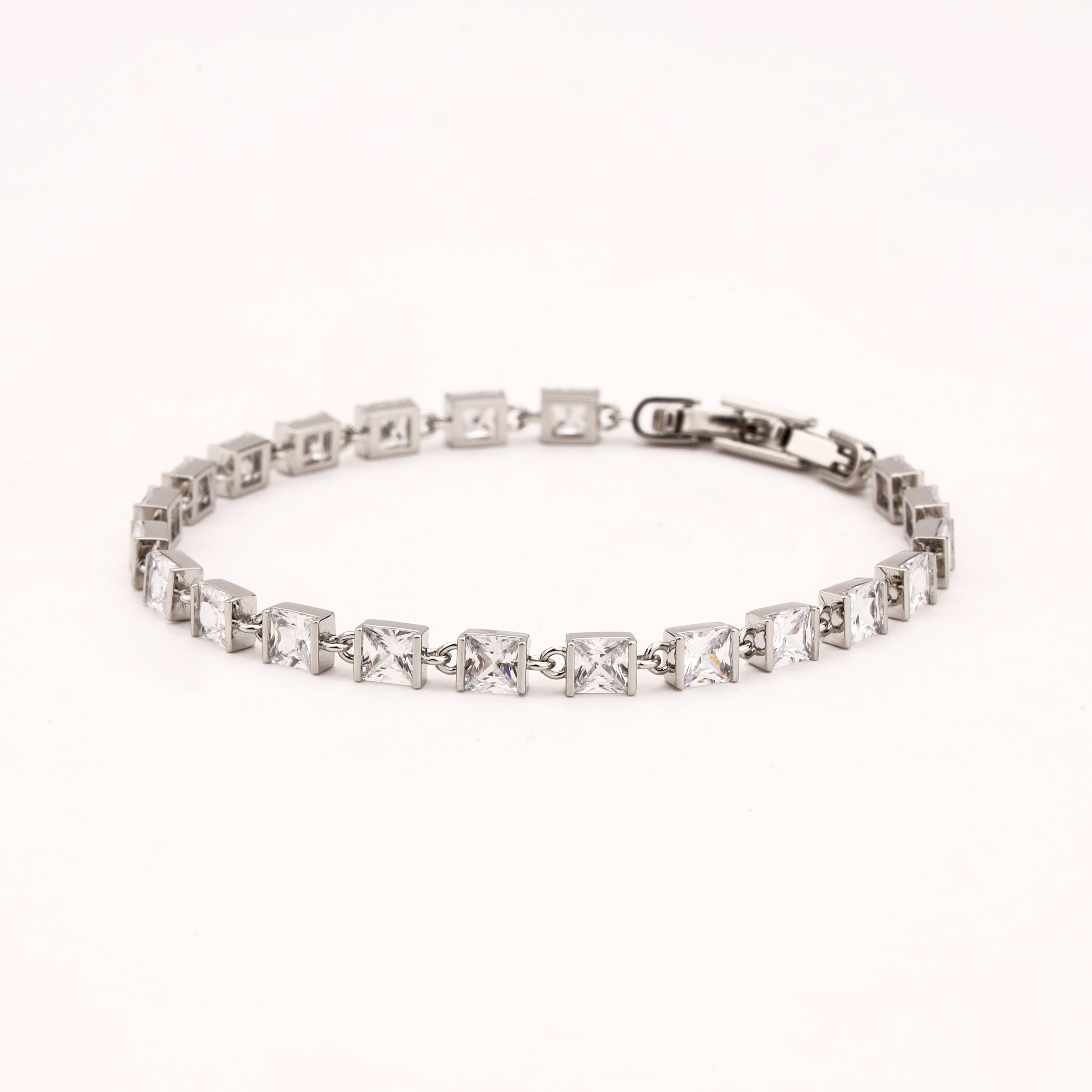 Evelisse silver-tone link bracelet with clear square-cut crystal stones in geometric settings
