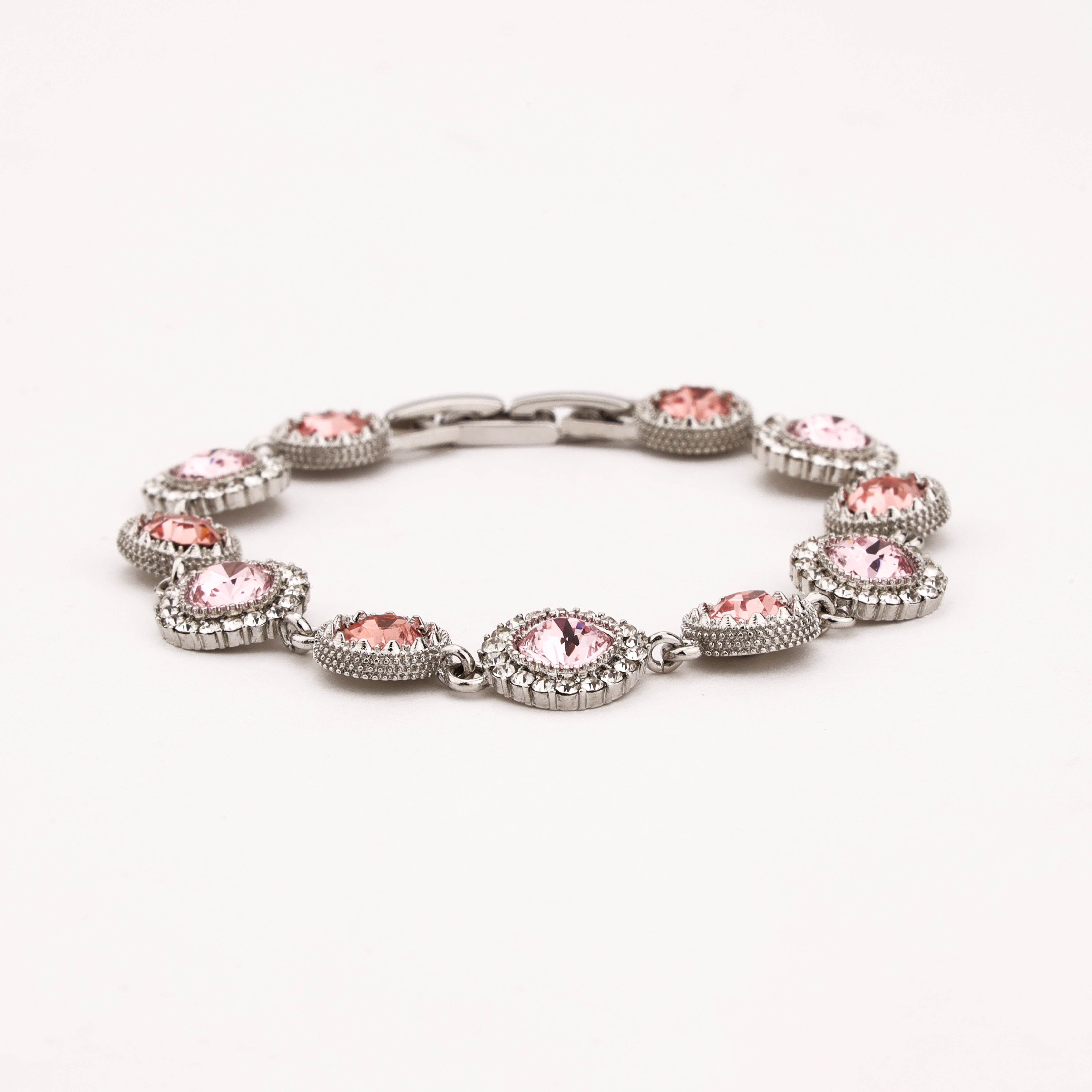 Rosavelle silver-tone bracelet with blush and rose-pink crystal stones surrounded by sparkling clear halo accents