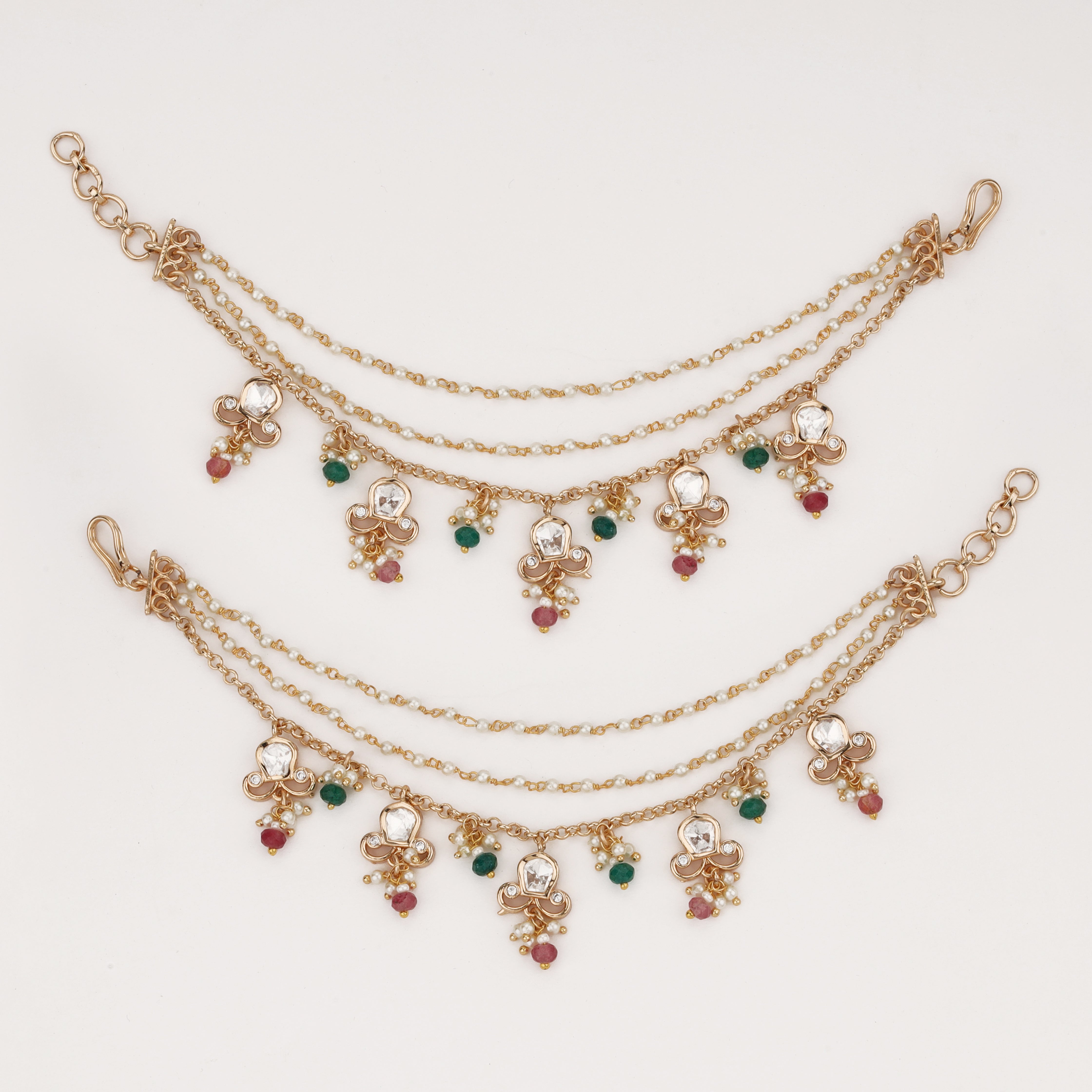 Regal multicolor charm ear chain with crystal motifs, pearl accents, and layered chains by US Catalog