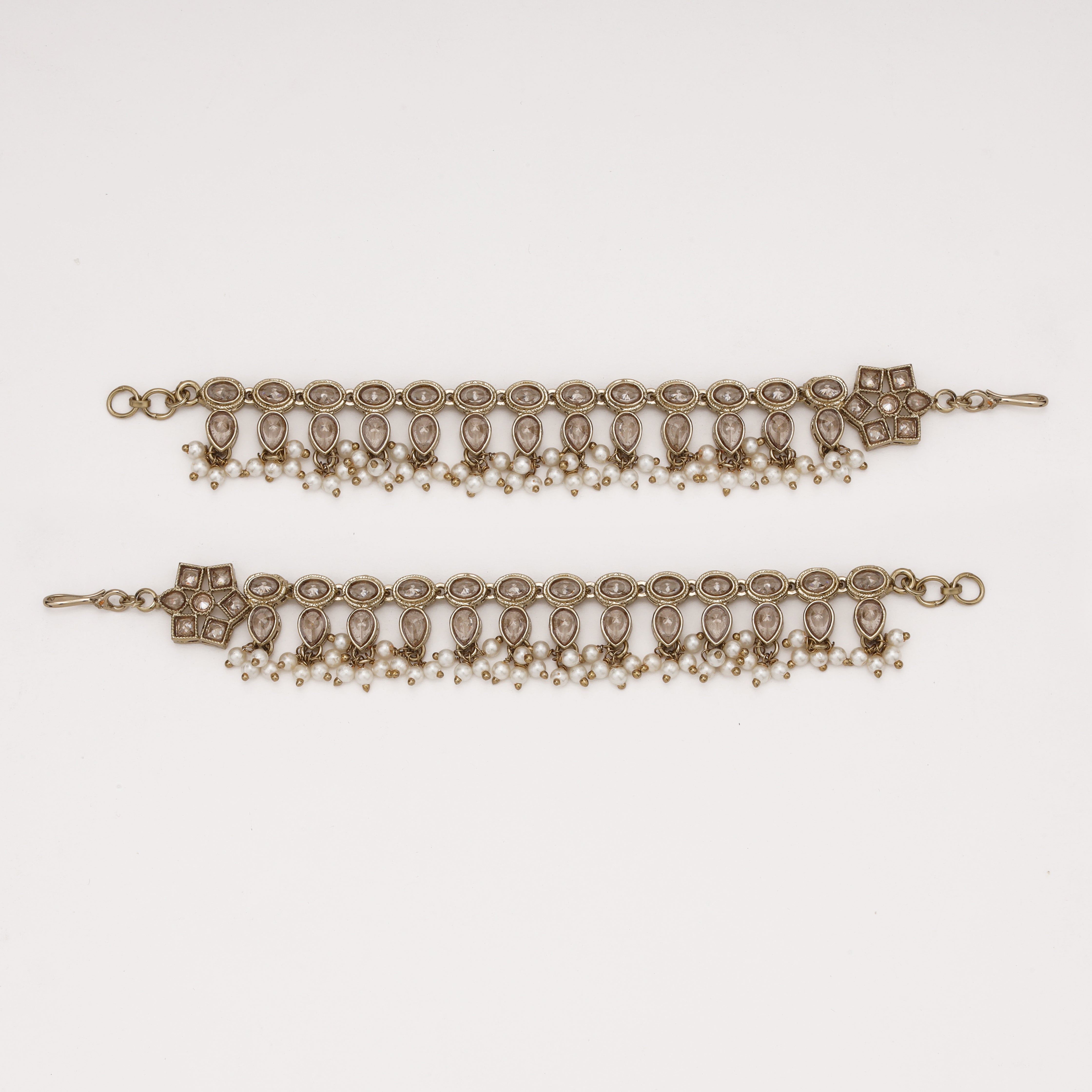 Royal Champagne Pearl Ear Chain with crystal motifs and pearl tassels by US Catalog