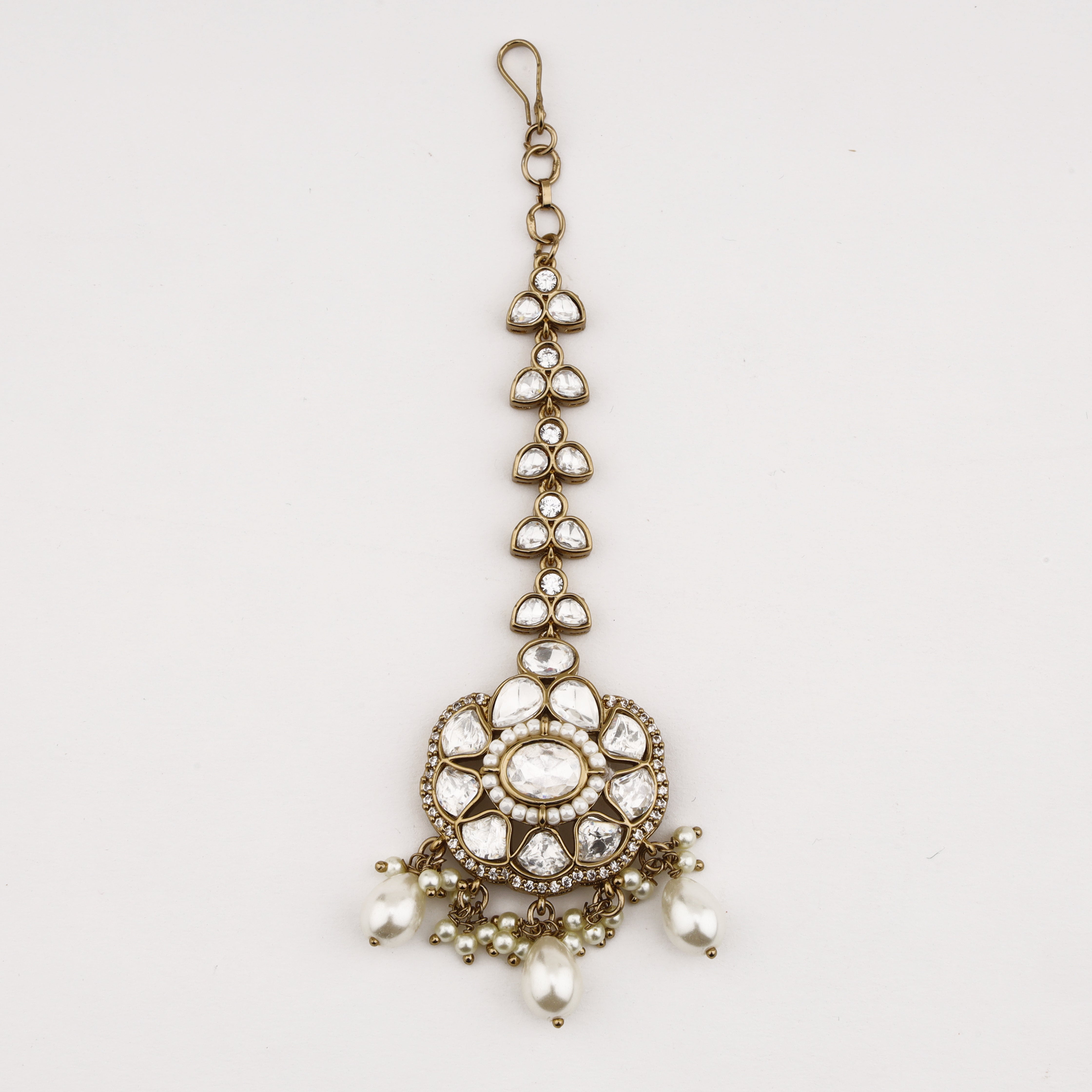 Pearl Bloom Crystal Maang Tika with floral crystal design and pearl drop tassels by US Catalog