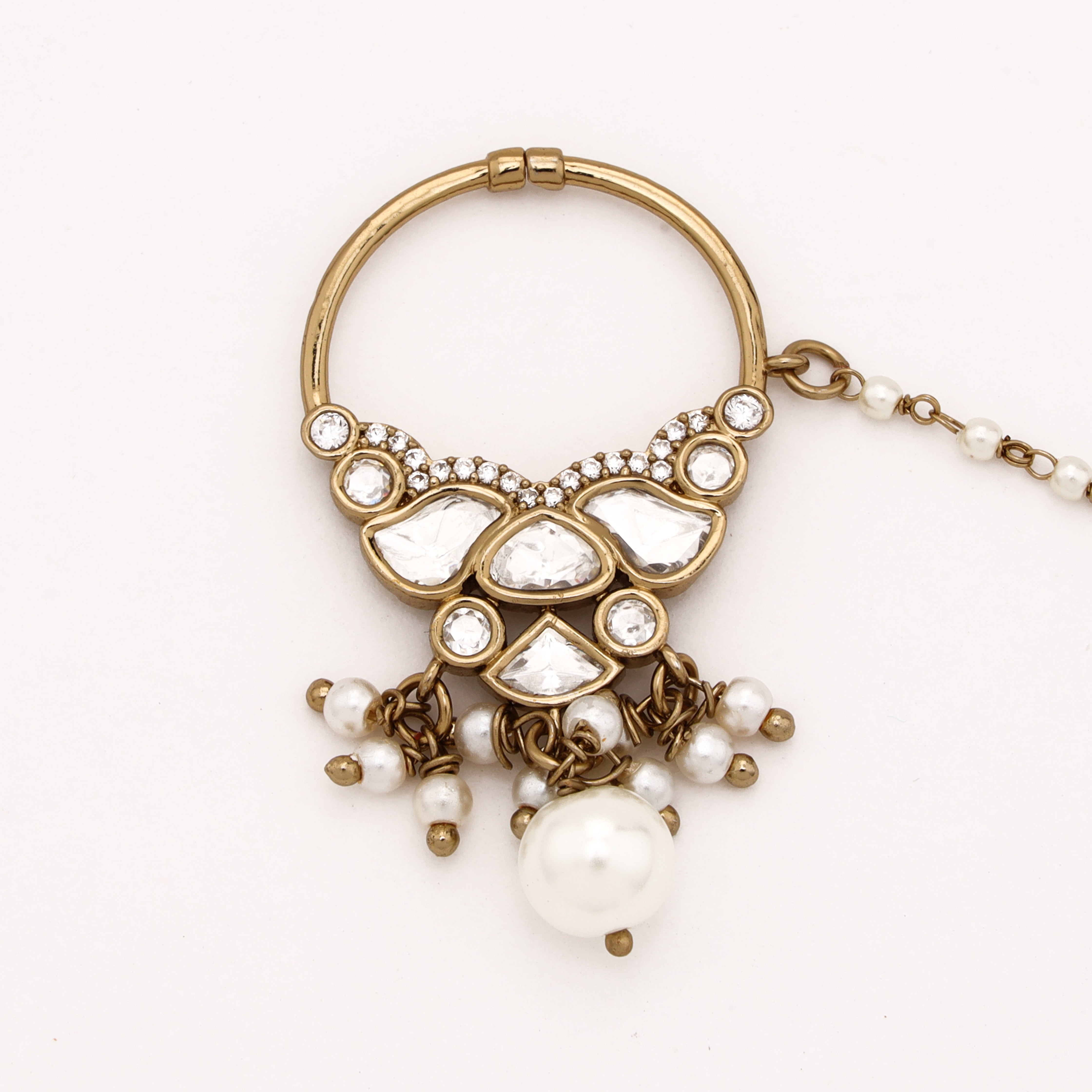 Antique gold Aarisha regal polki pearl nath with ornate white stones, layered pearl drops and attached beaded chain from US Catalog