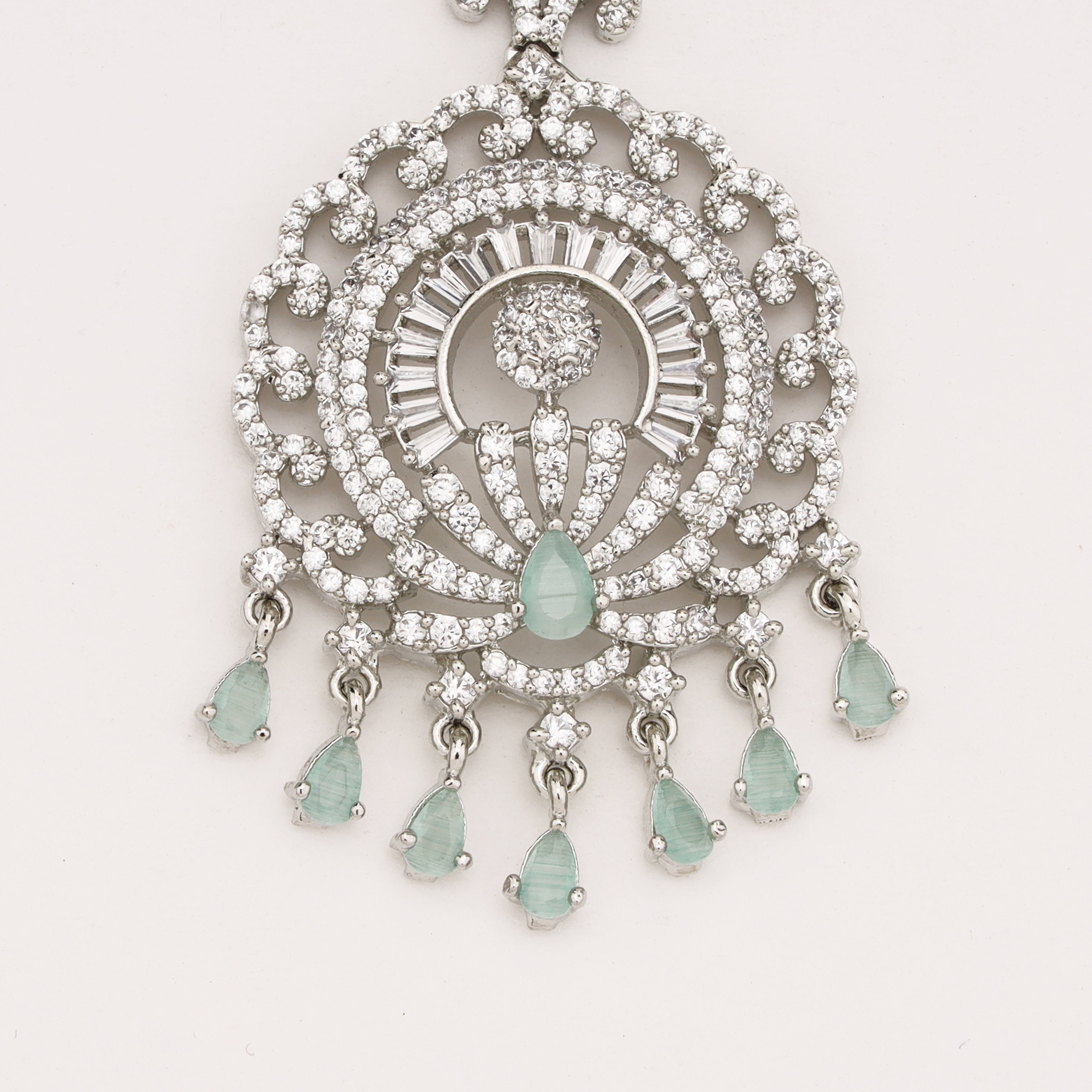 Silver Finish Mint Green Stone American Diamond Round Halo Maang Tikka