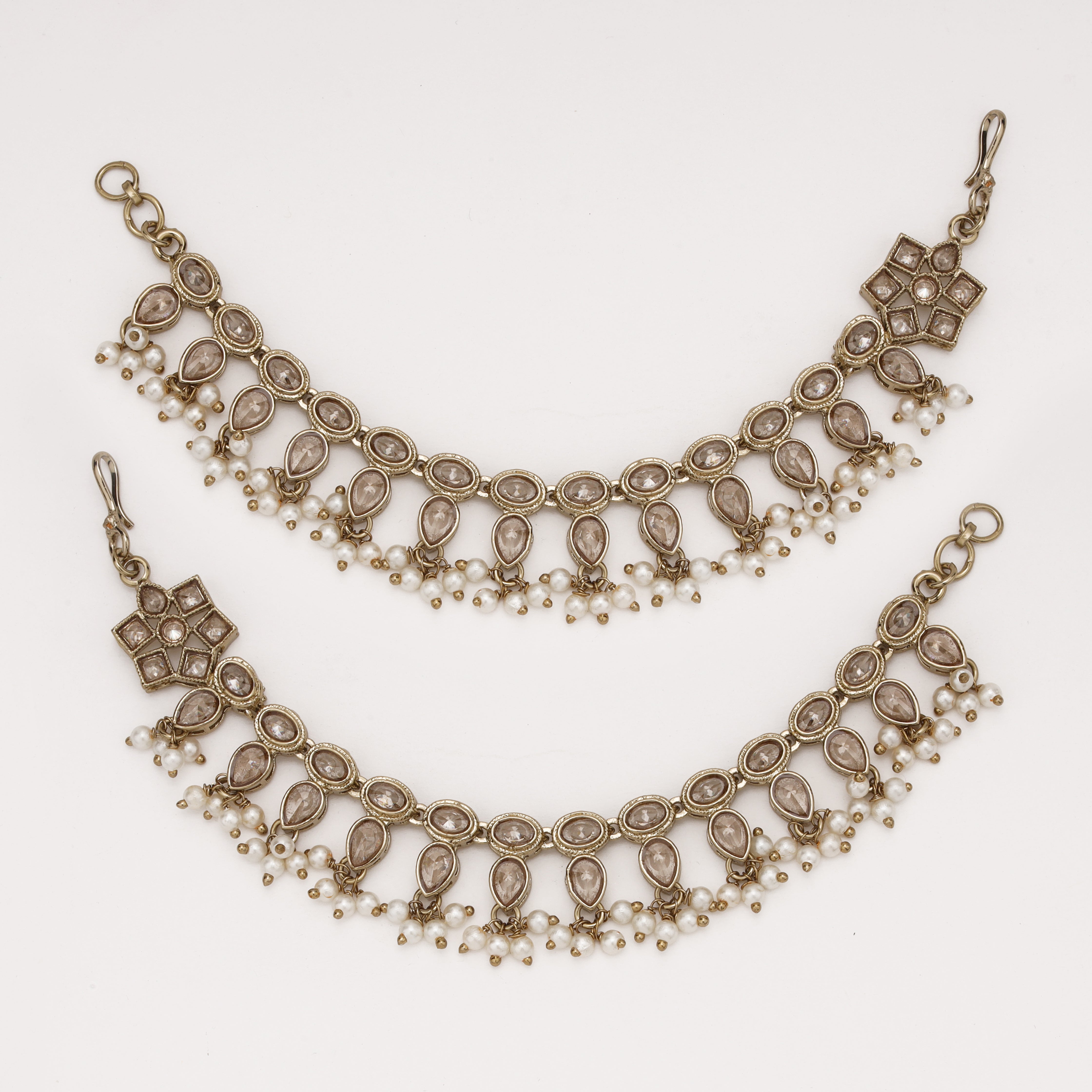 Royal Champagne Pearl Ear Chain with crystal motifs and pearl tassels by US Catalog