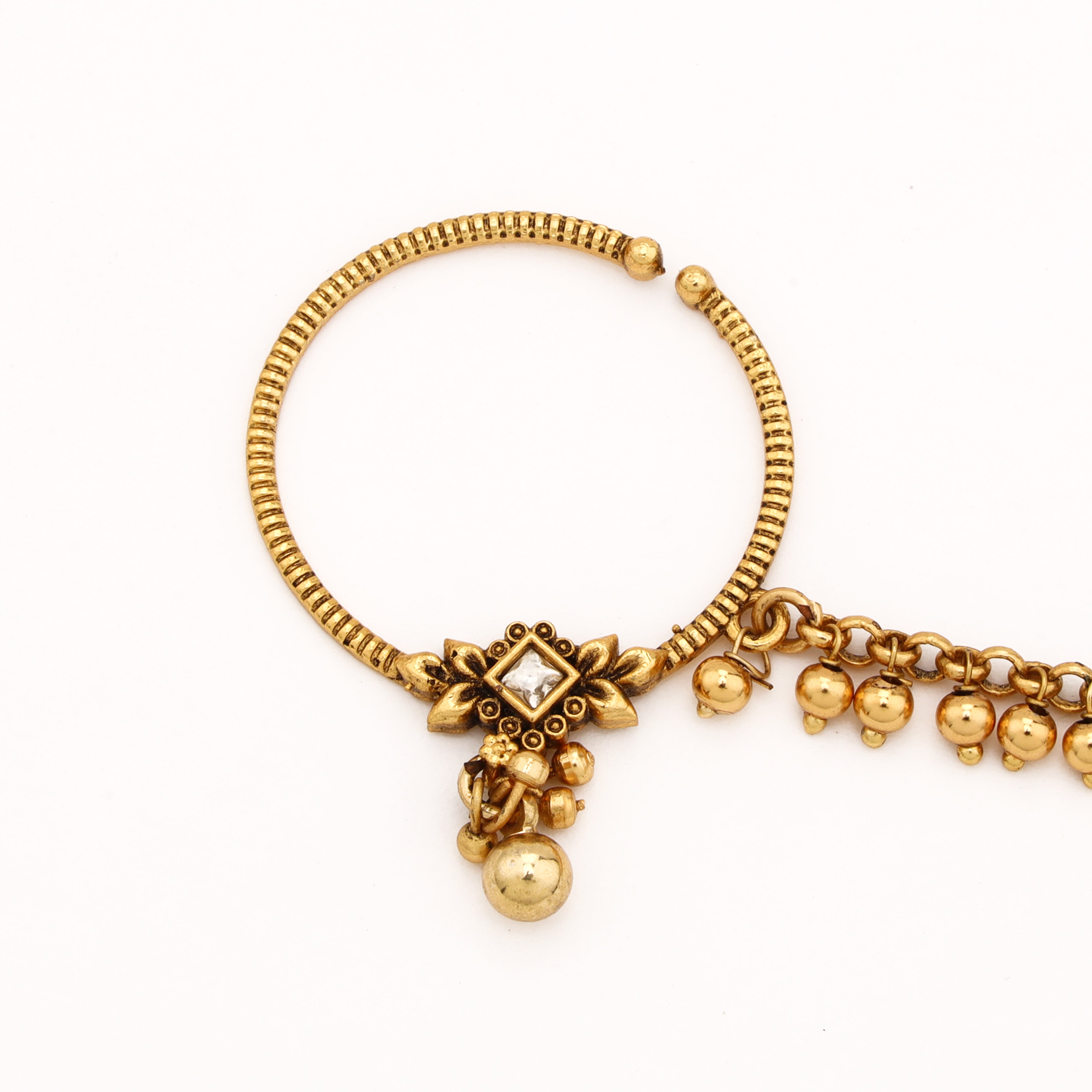 Antique gold Ghungroo Cascade Nath with textured hoop, floral stone motif and metal bead chain from US Catalog