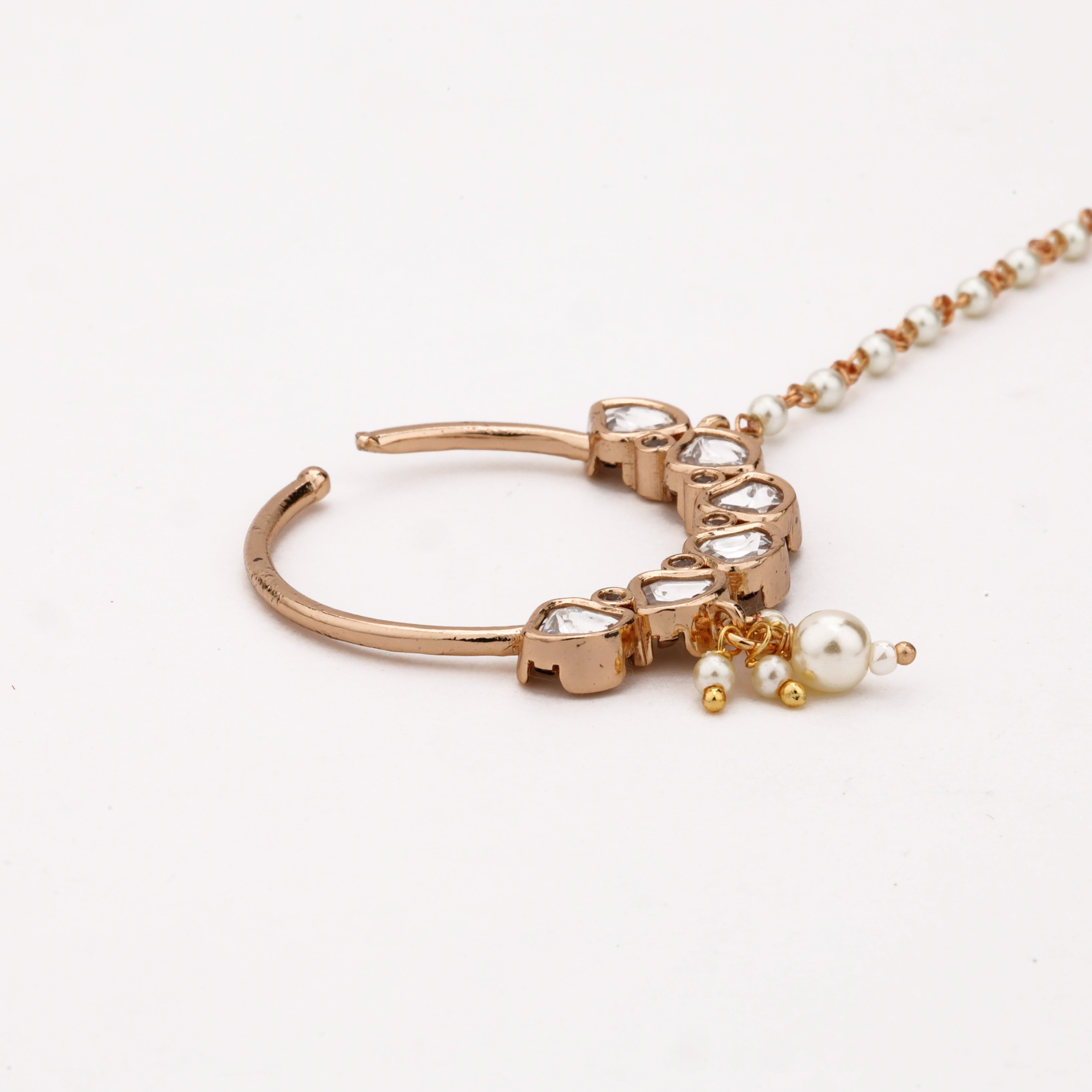 Rose gold Crescent Polki Pearl Nath with geometric white stones, pearl drop and attached beaded chain from US Catalog