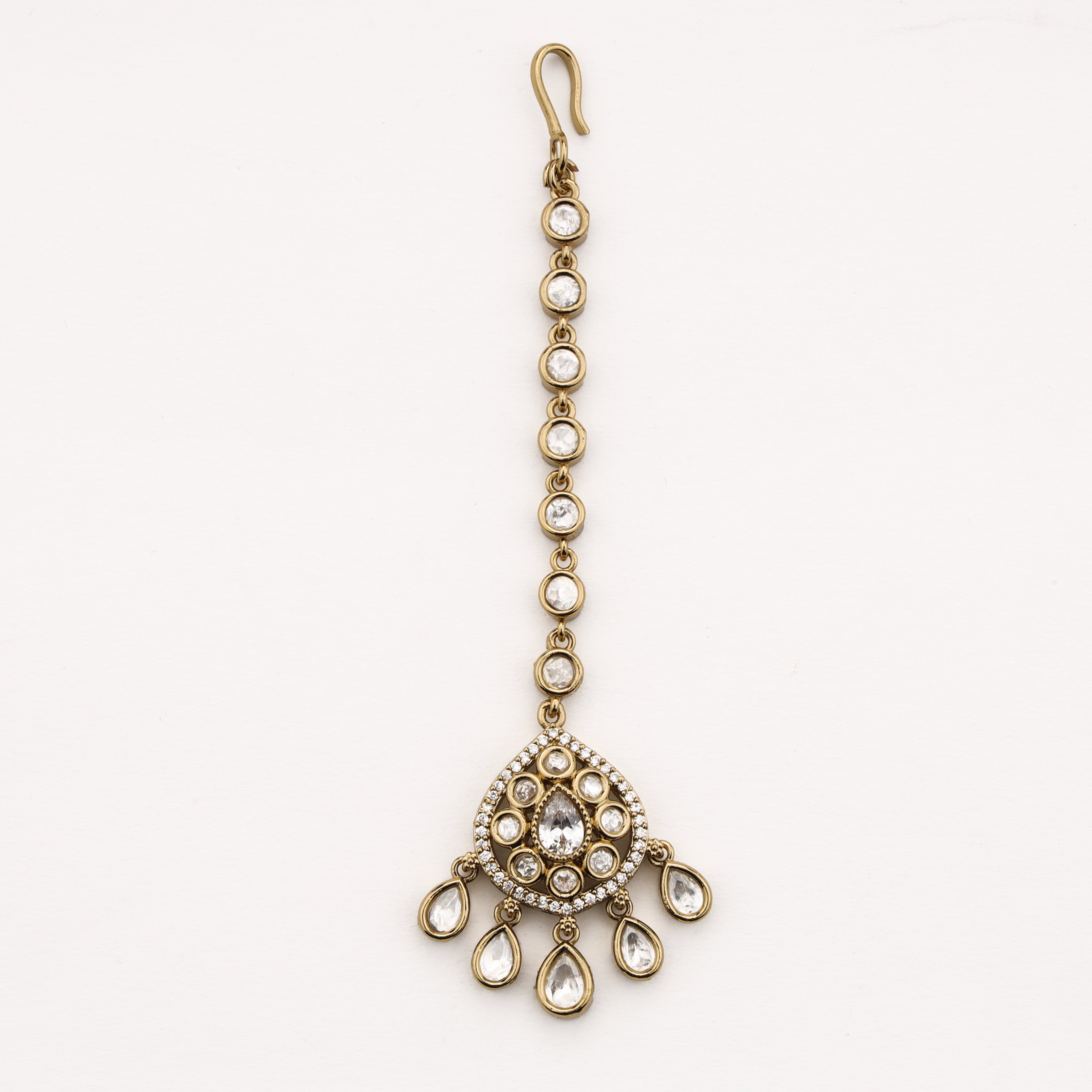Halo crystal Maang Tika with pear-shaped crystal drops and gold finish by US Catalog
