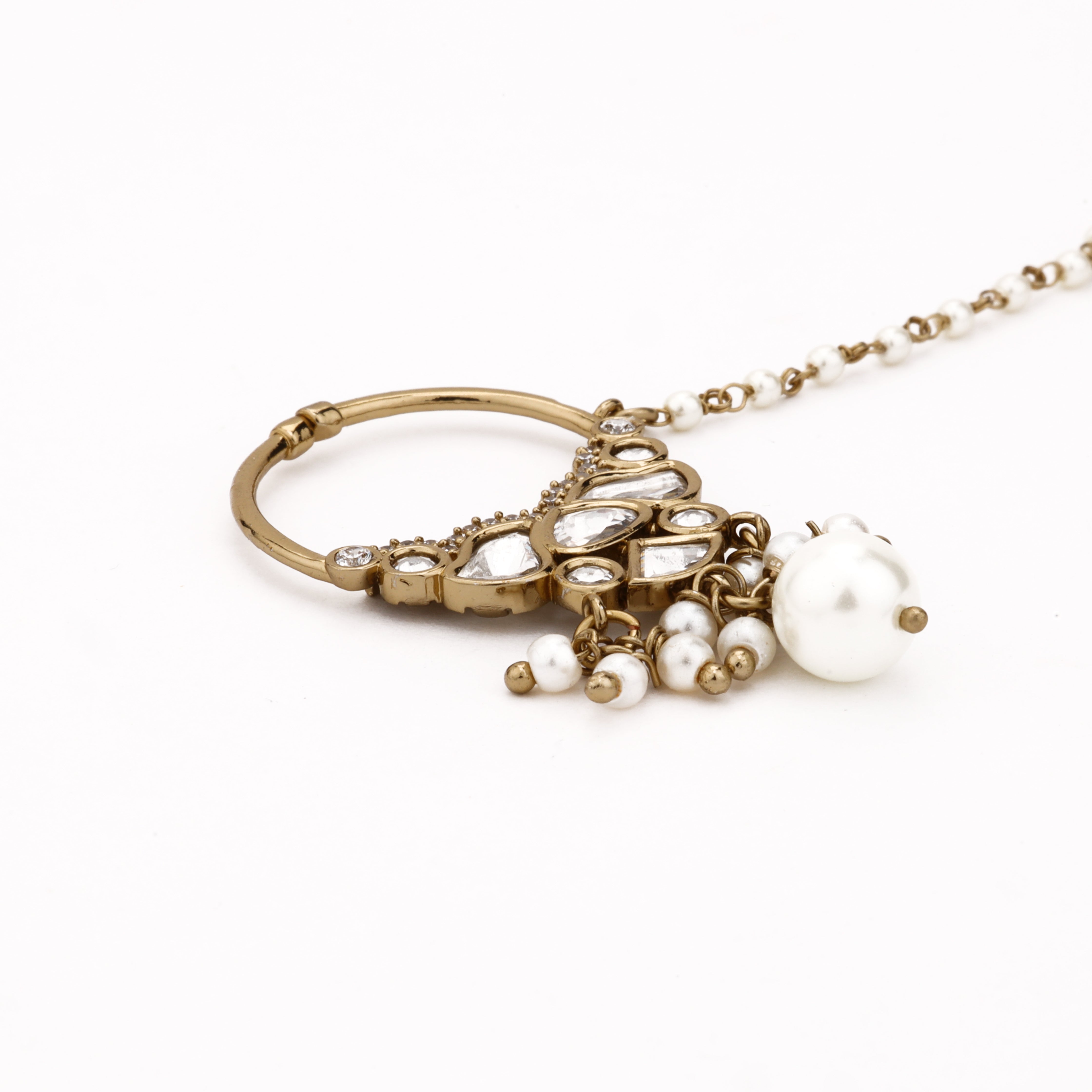 Antique gold Aarisha regal polki pearl nath with ornate white stones, layered pearl drops and attached beaded chain from US Catalog