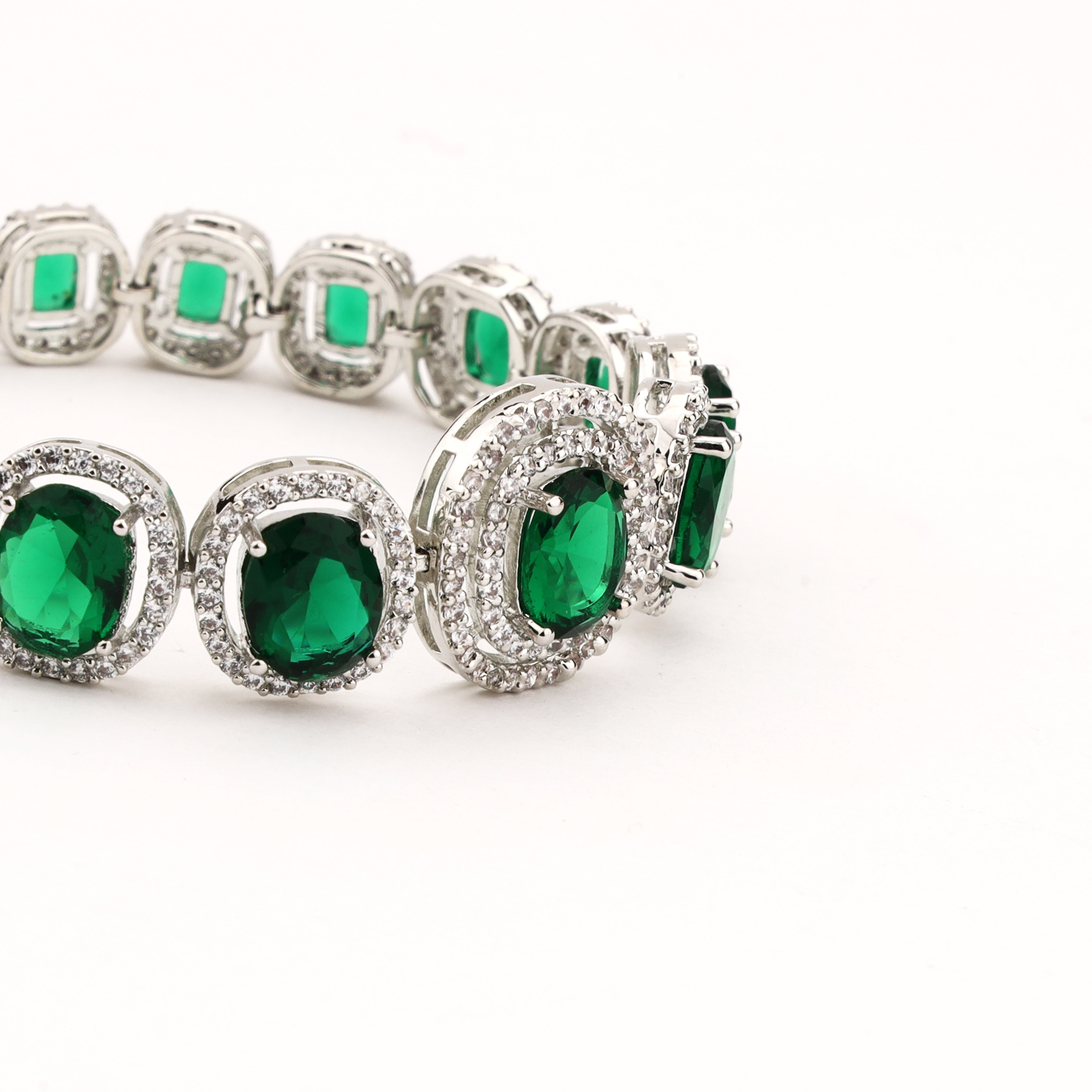 Emerald emerald green crystal bracelet with oval stones, sparkling double halo accents and silver-tone setting