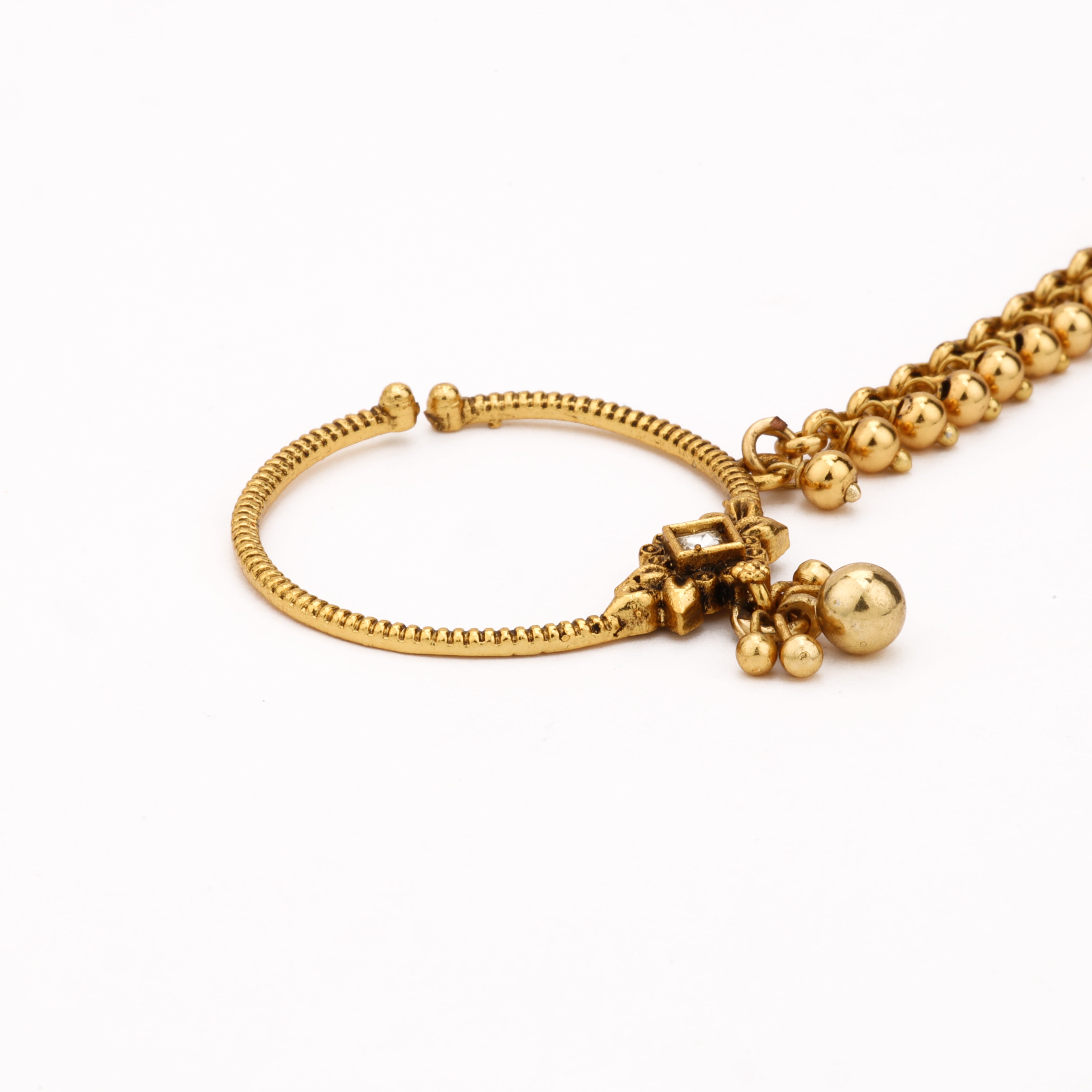 Antique gold Ghungroo Cascade Nath with textured hoop, floral stone motif and metal bead chain from US Catalog