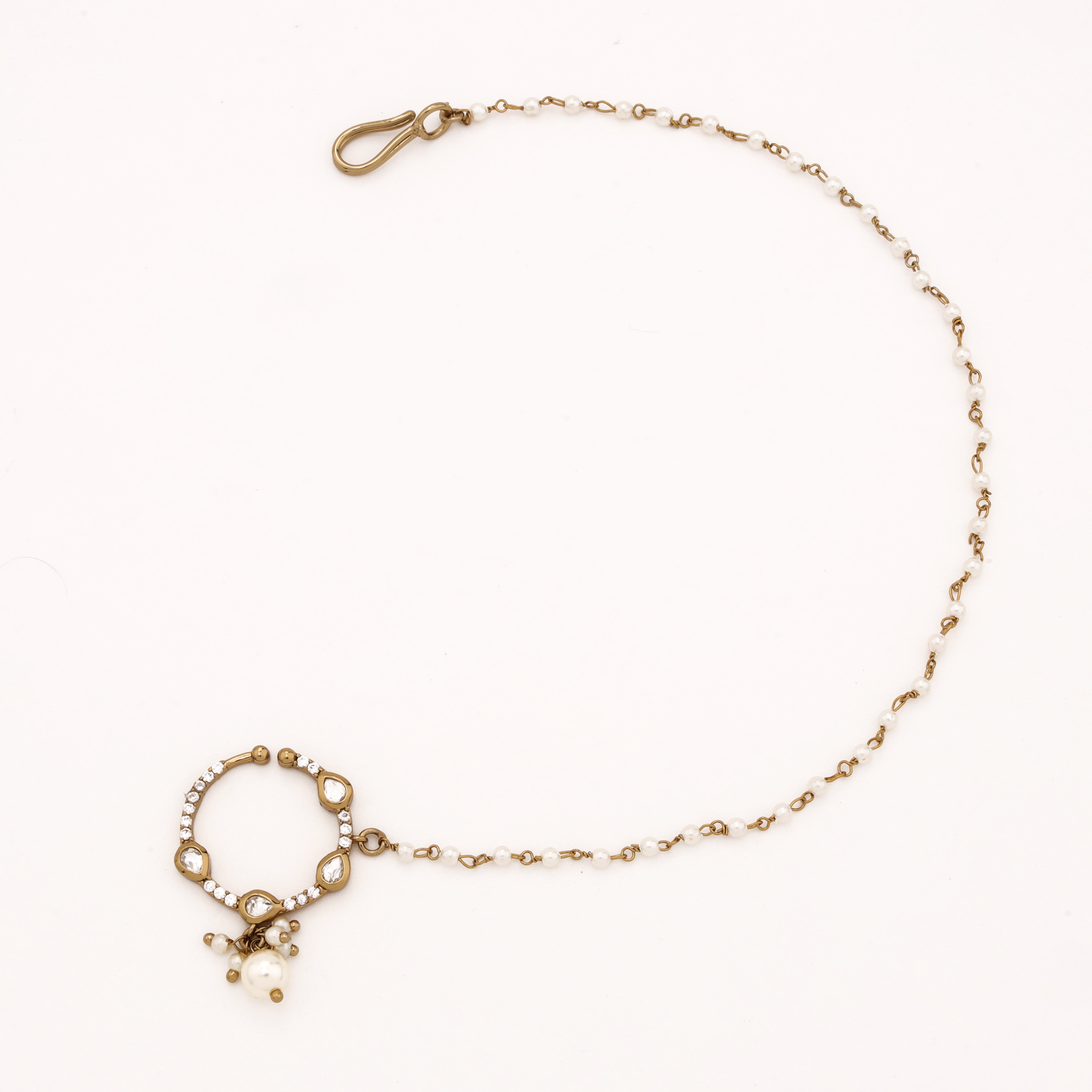 Antique gold Tavisha teardrop polki pearl nath with four white stones, pearl drop and attached beaded chain from US Catalog