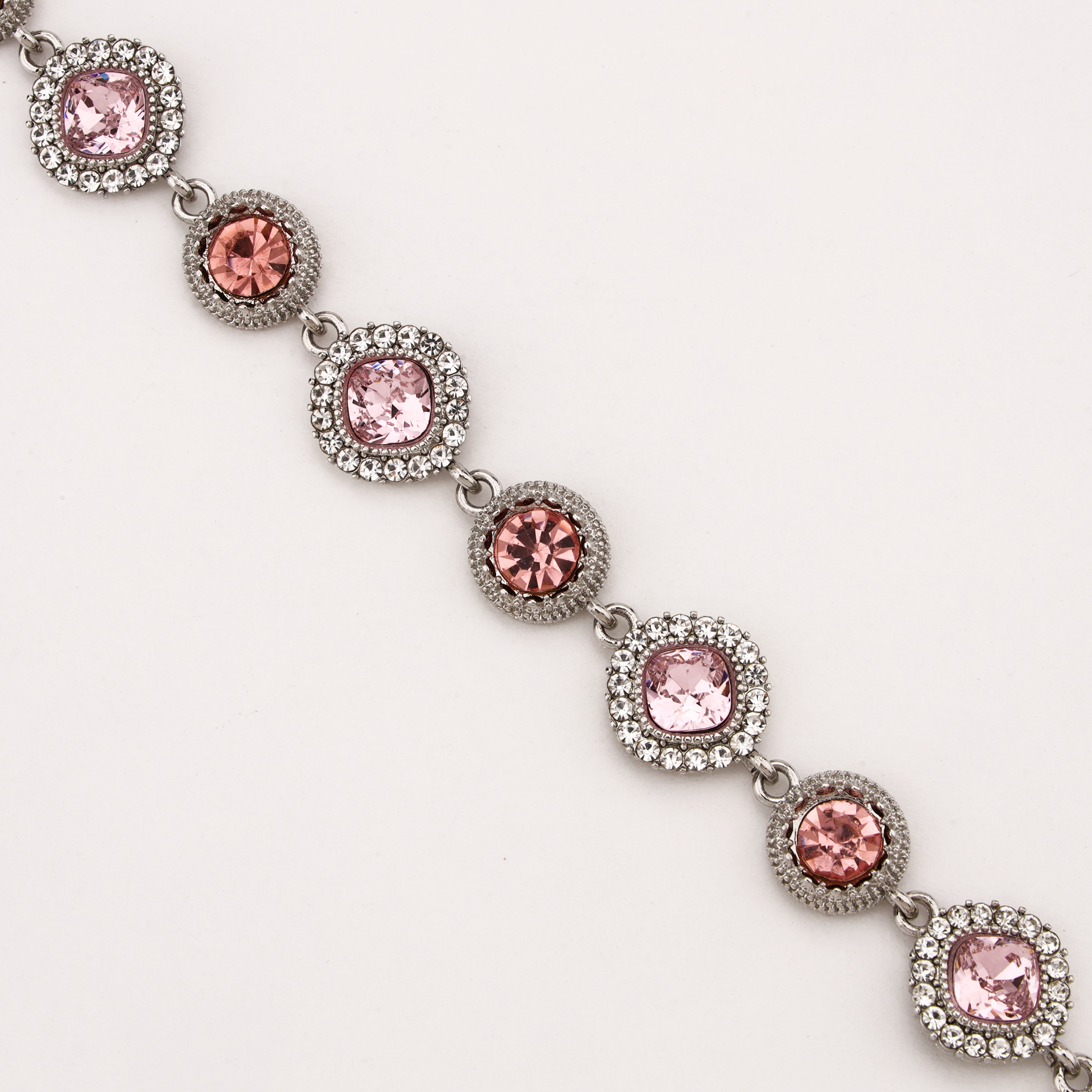 Rosavelle silver-tone bracelet with blush and rose-pink crystal stones surrounded by sparkling clear halo accents