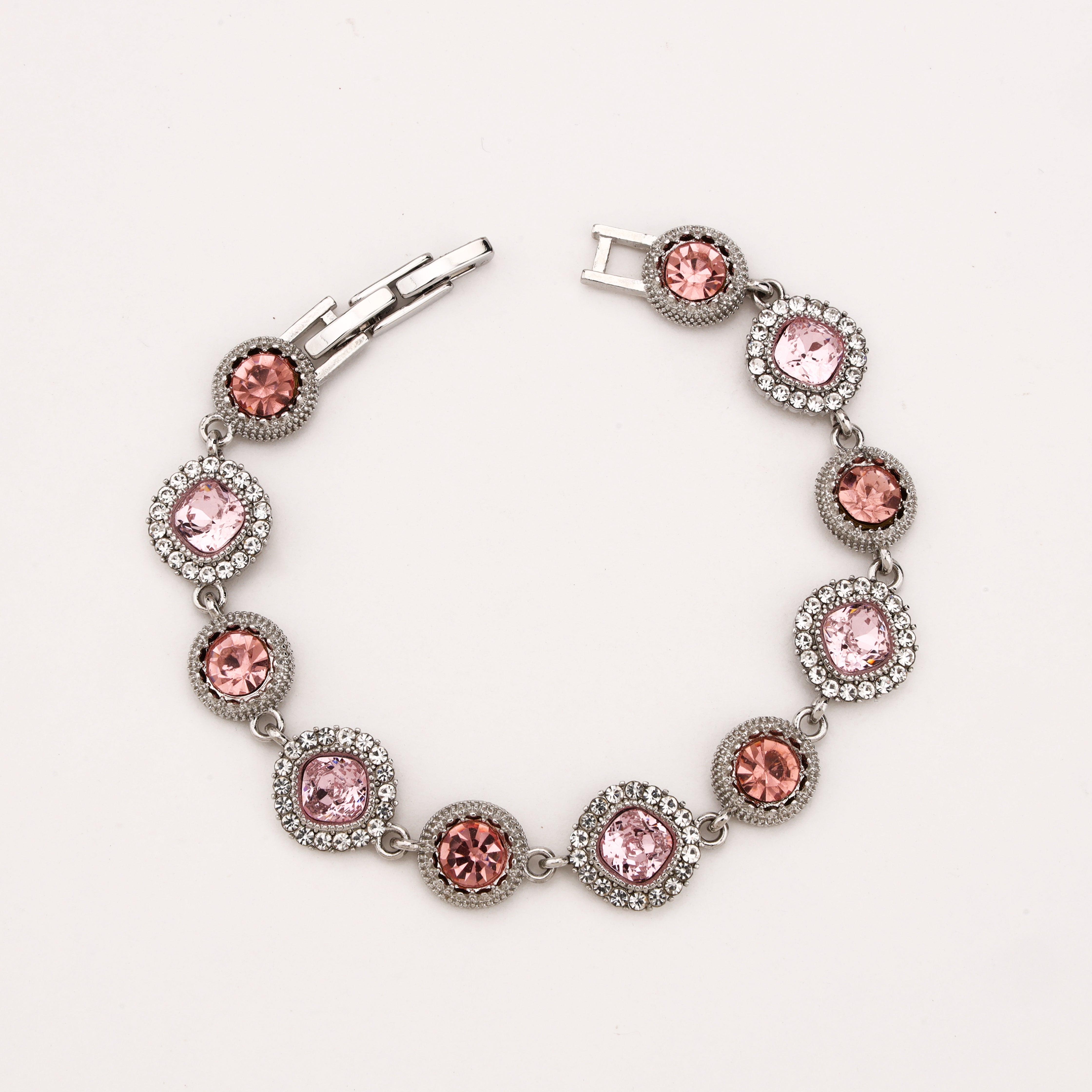 Rosavelle silver-tone bracelet with blush and rose-pink crystal stones surrounded by sparkling clear halo accents