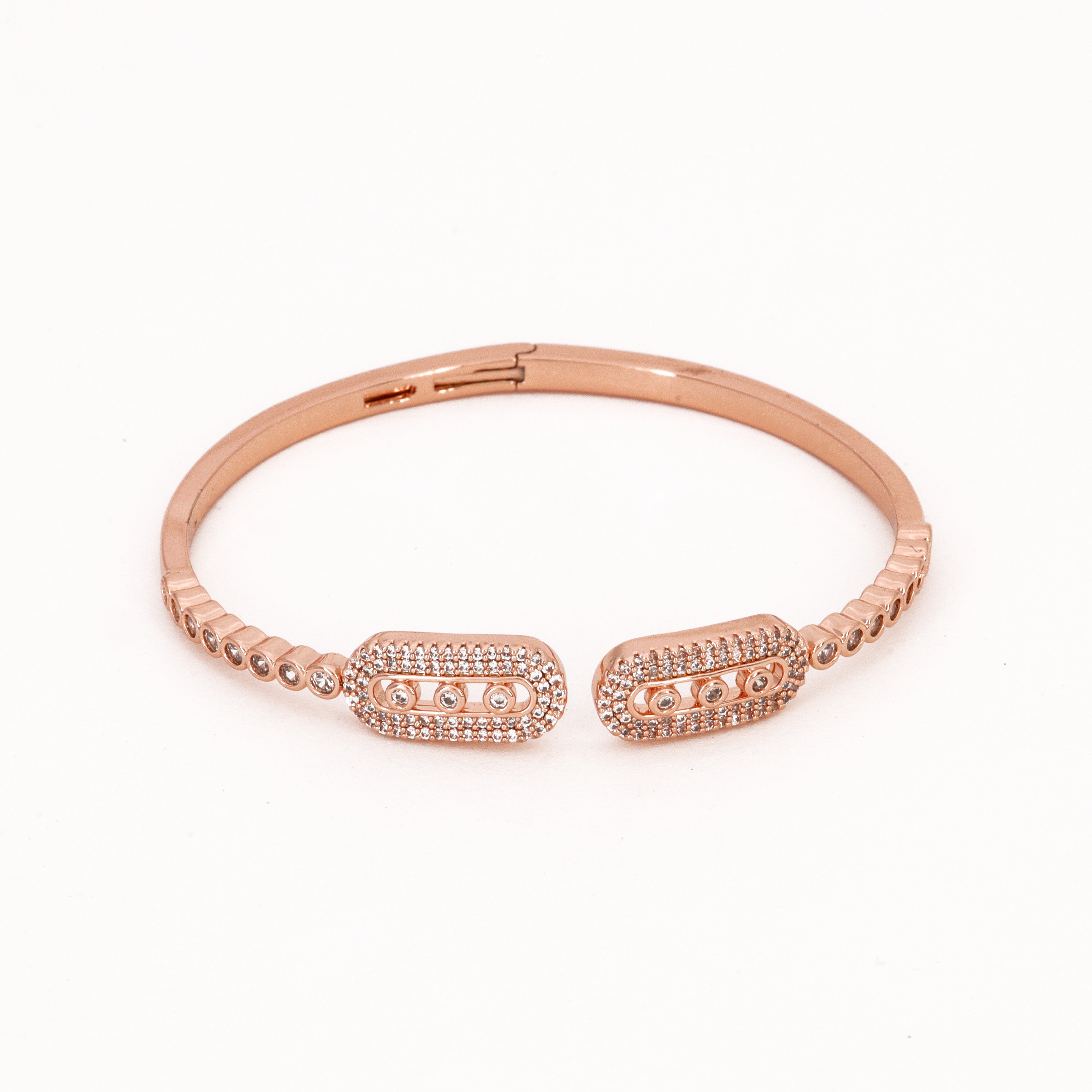 Rose Gold Tone Crystal Geometric Open Bracelet featuring an open-front design with bezel-set stones and pavé cut-out motifs on a white background