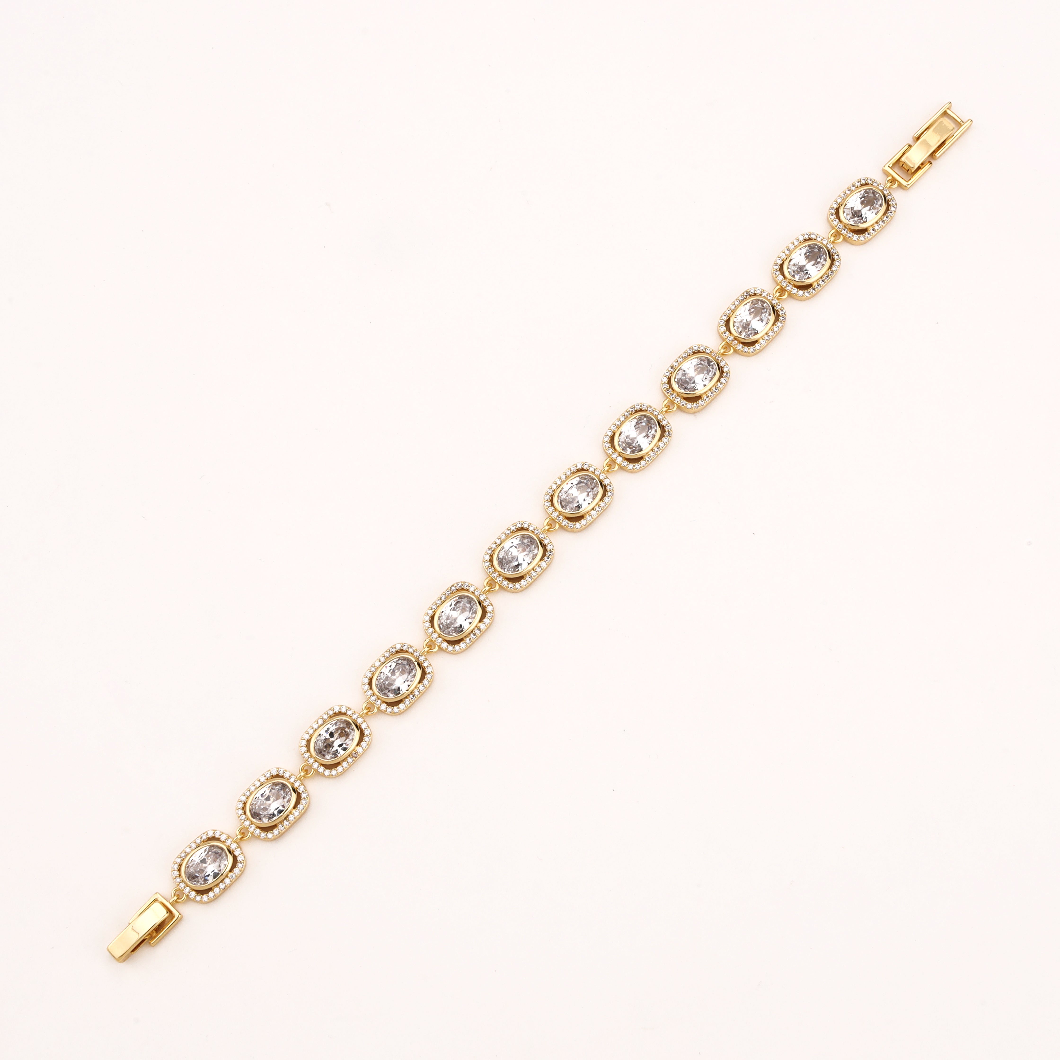 Gold-tone Oval Halo Crystal Tennis Bracelet