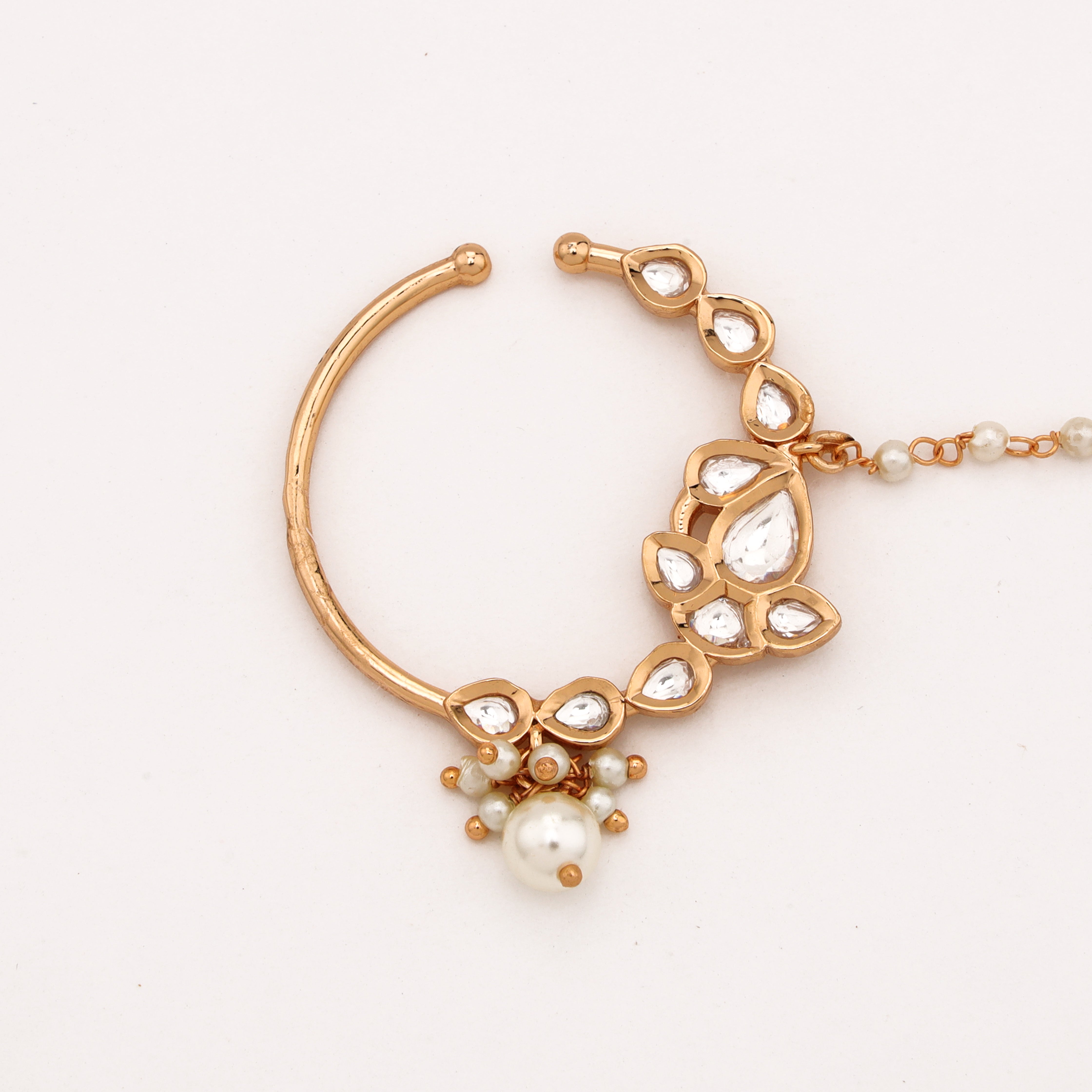 Rose gold Roshika leaf cascade polki pearl nath with teardrop stones, pearl drop and attached beaded chain from US Catalog