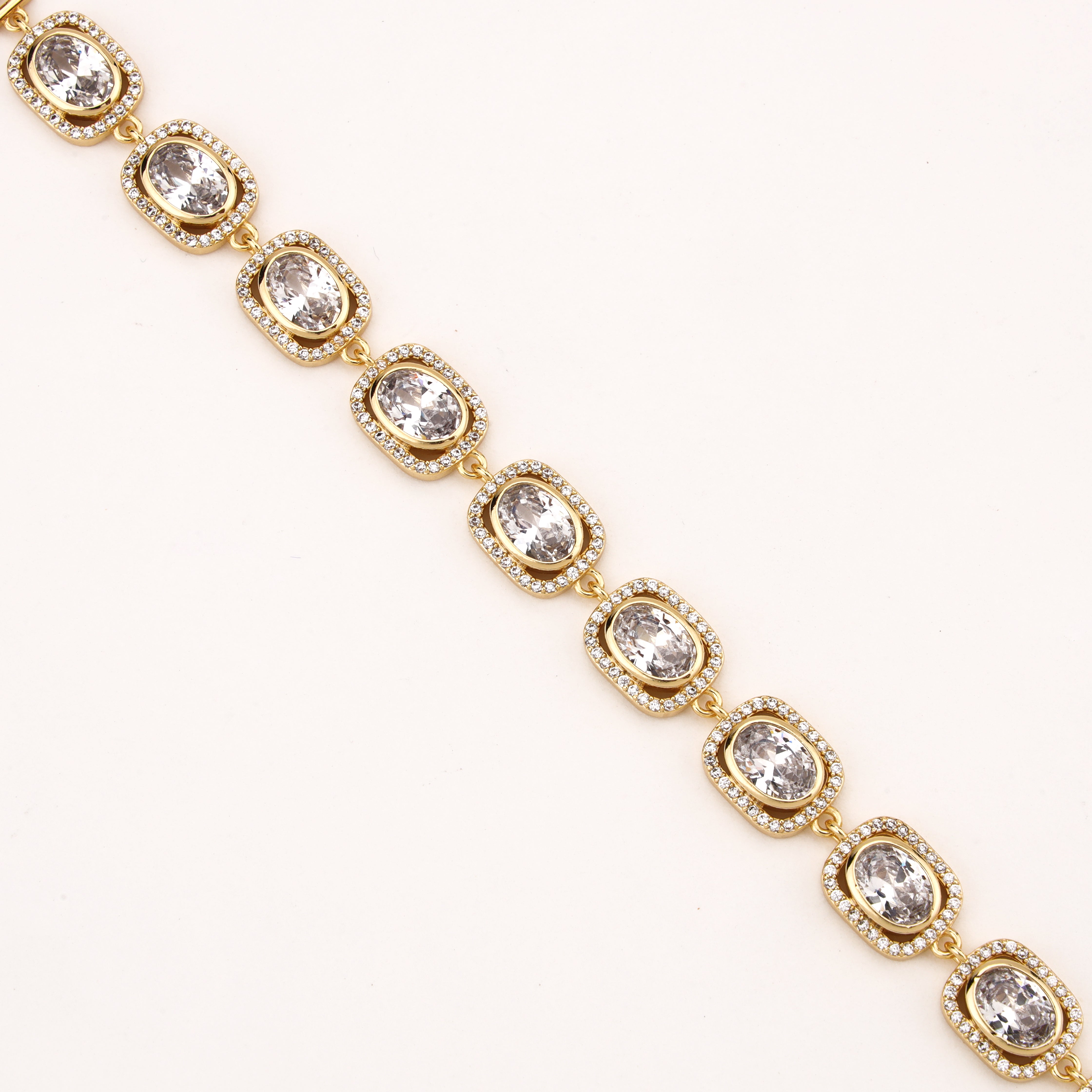 Gold-tone Oval Halo Crystal Tennis Bracelet
