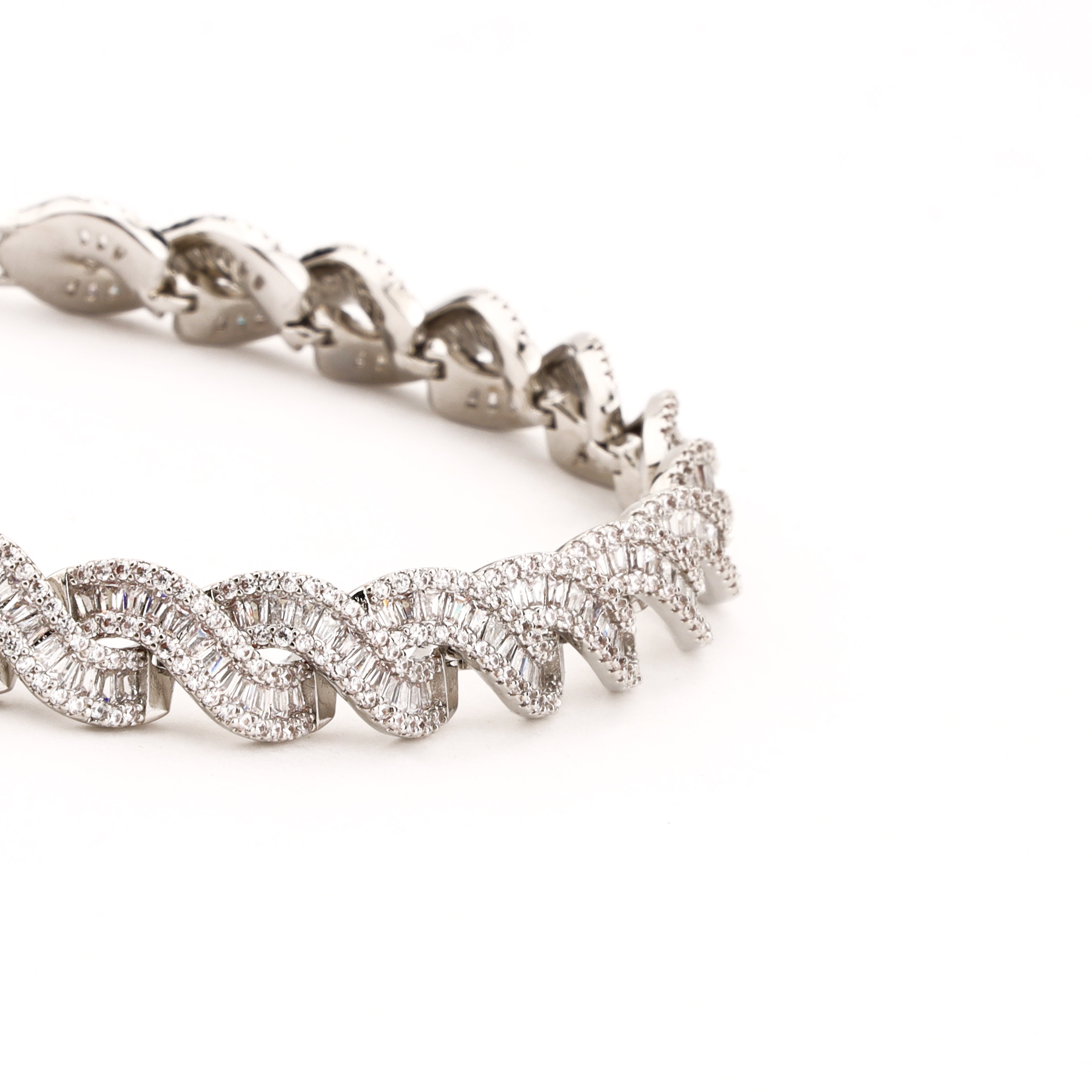 Lorienne silver-tone infinity bracelet with clear pavé and baguette-style crystal detailing