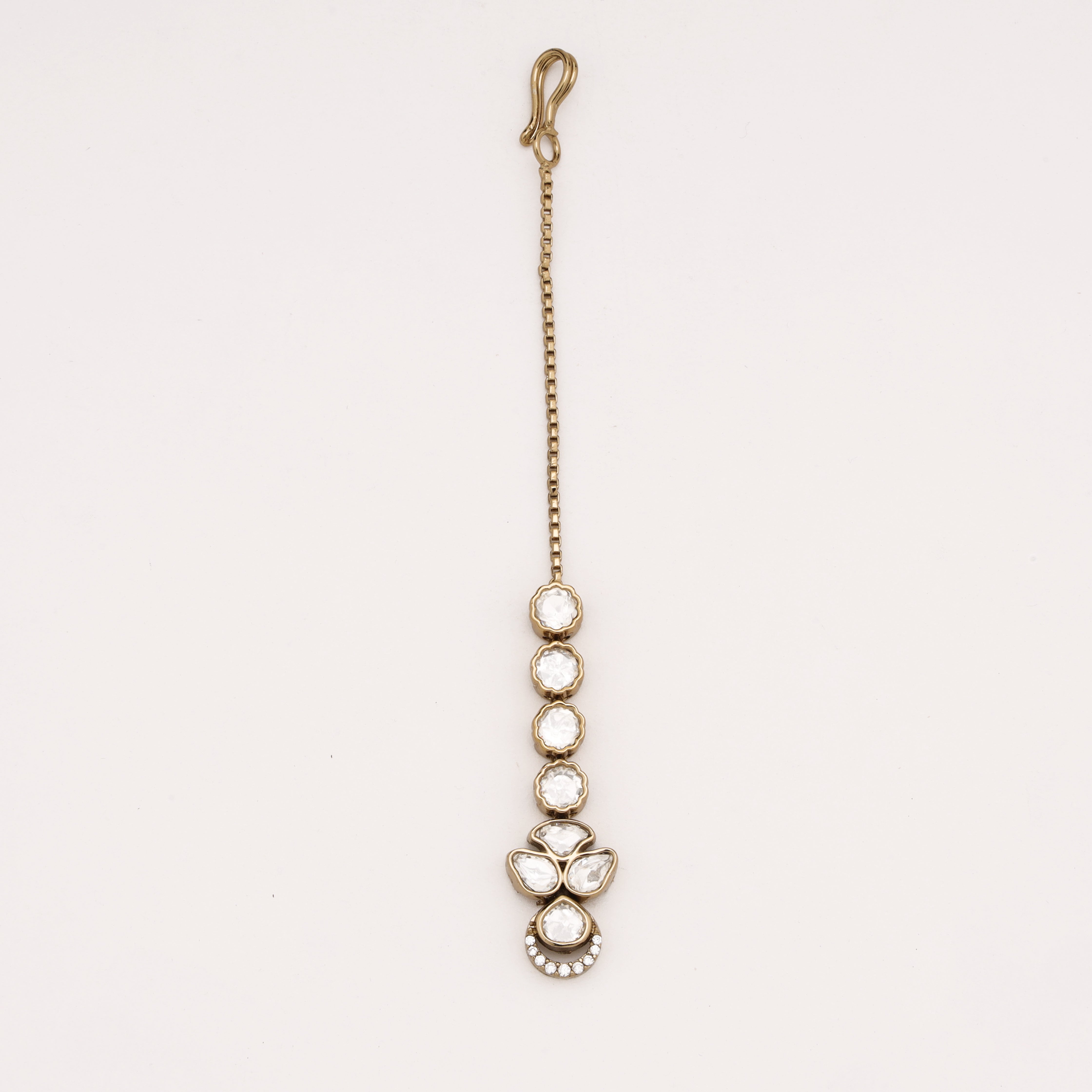 Antique gold Noor Kundan Drop Maang Tika featuring white kundan stones and elegant traditional detailing by US Catalog.
