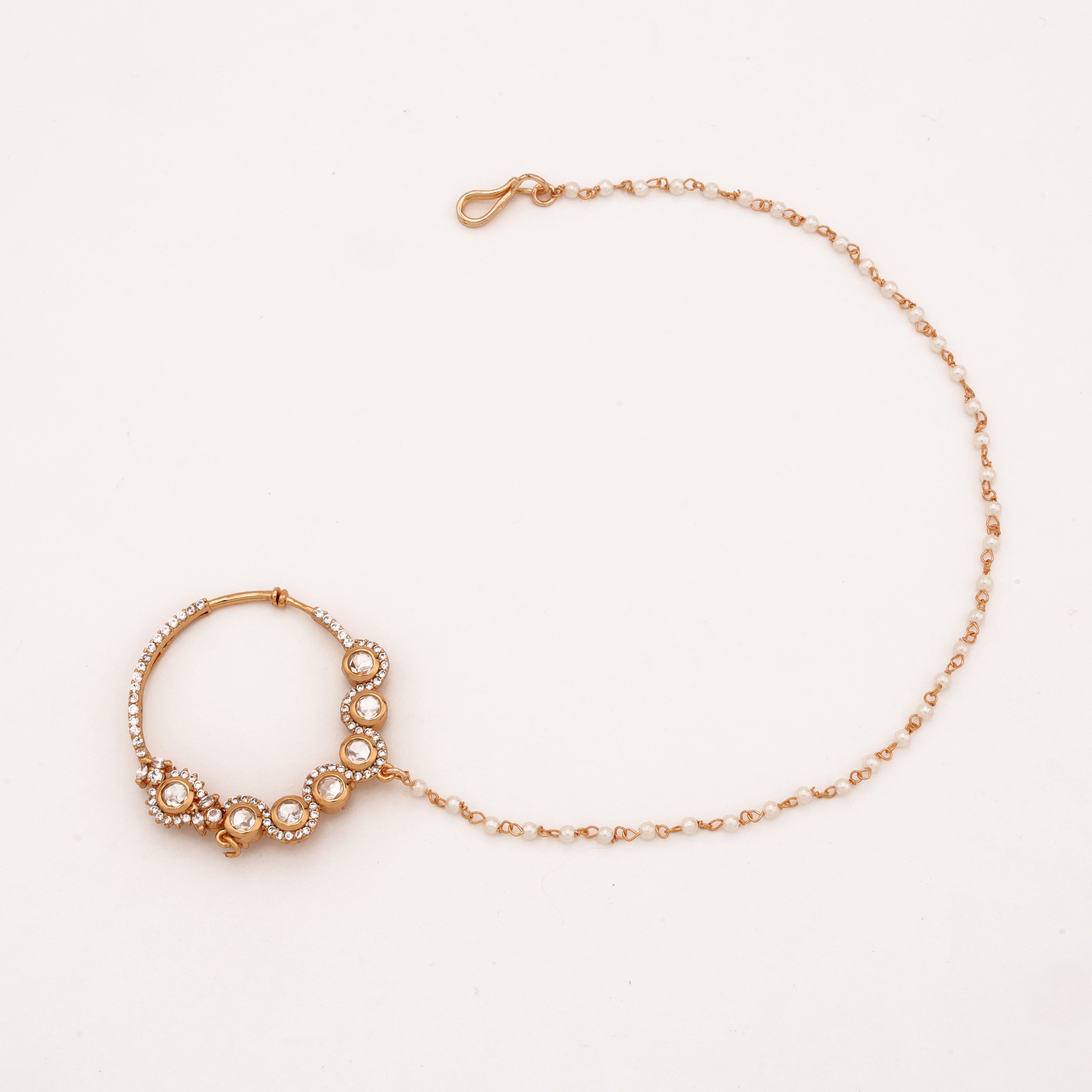 Rose gold Samaira halo polki nath with round white stones, crystal detailing and pearl-beaded chain from US Catalog