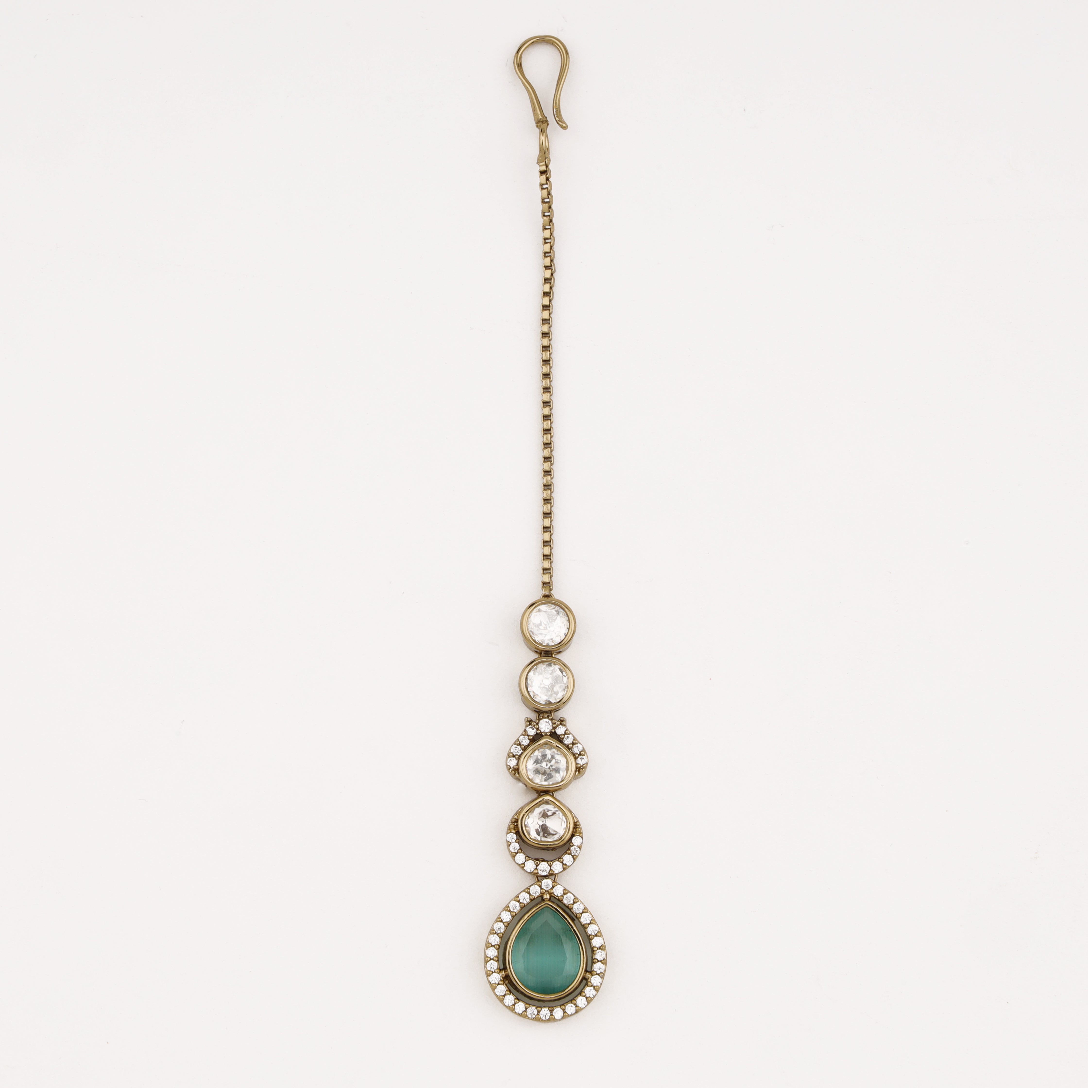 Emerald Teardrop Diamond Maang Tika with green stone and sparkling kundan crystals in antique gold finish by US Catalog