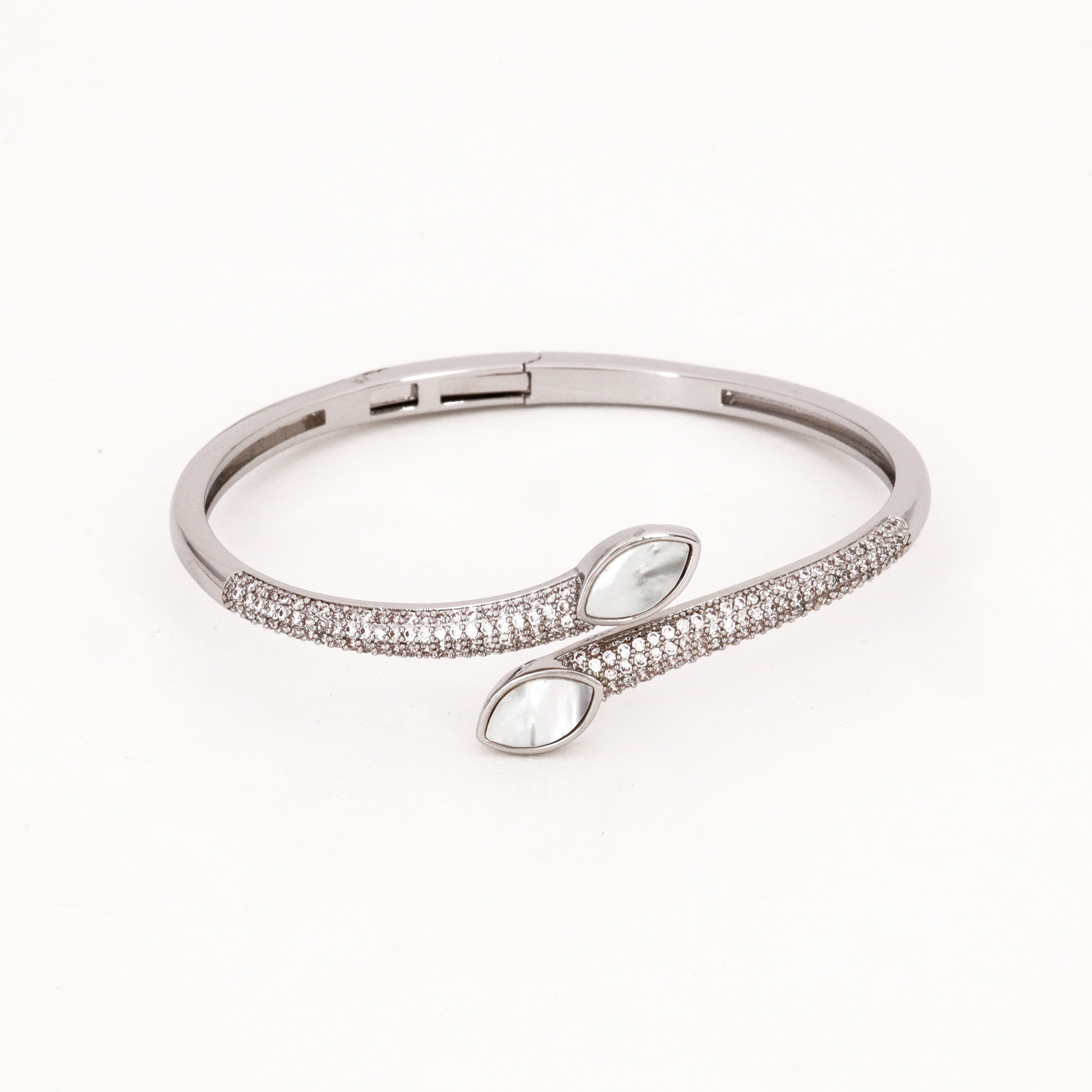 Crystal & White Marquise Bypass Bracelet featuring pavé bands and white stone terminals on a white background for US Catalog.