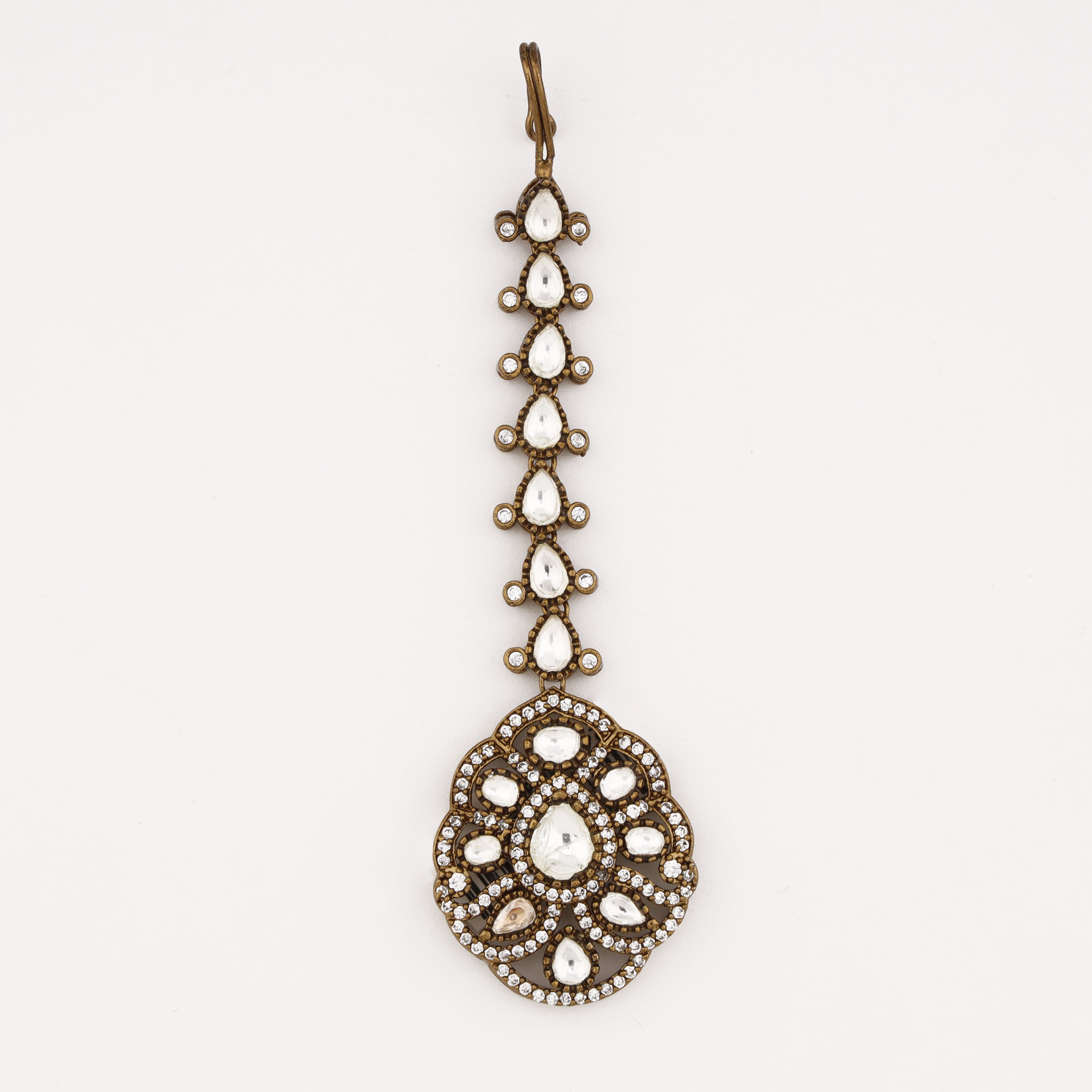 Regal Diamond Floral Maang Tika featuring white kundan stones and crystal detailing in an antique gold finish by US Catalog