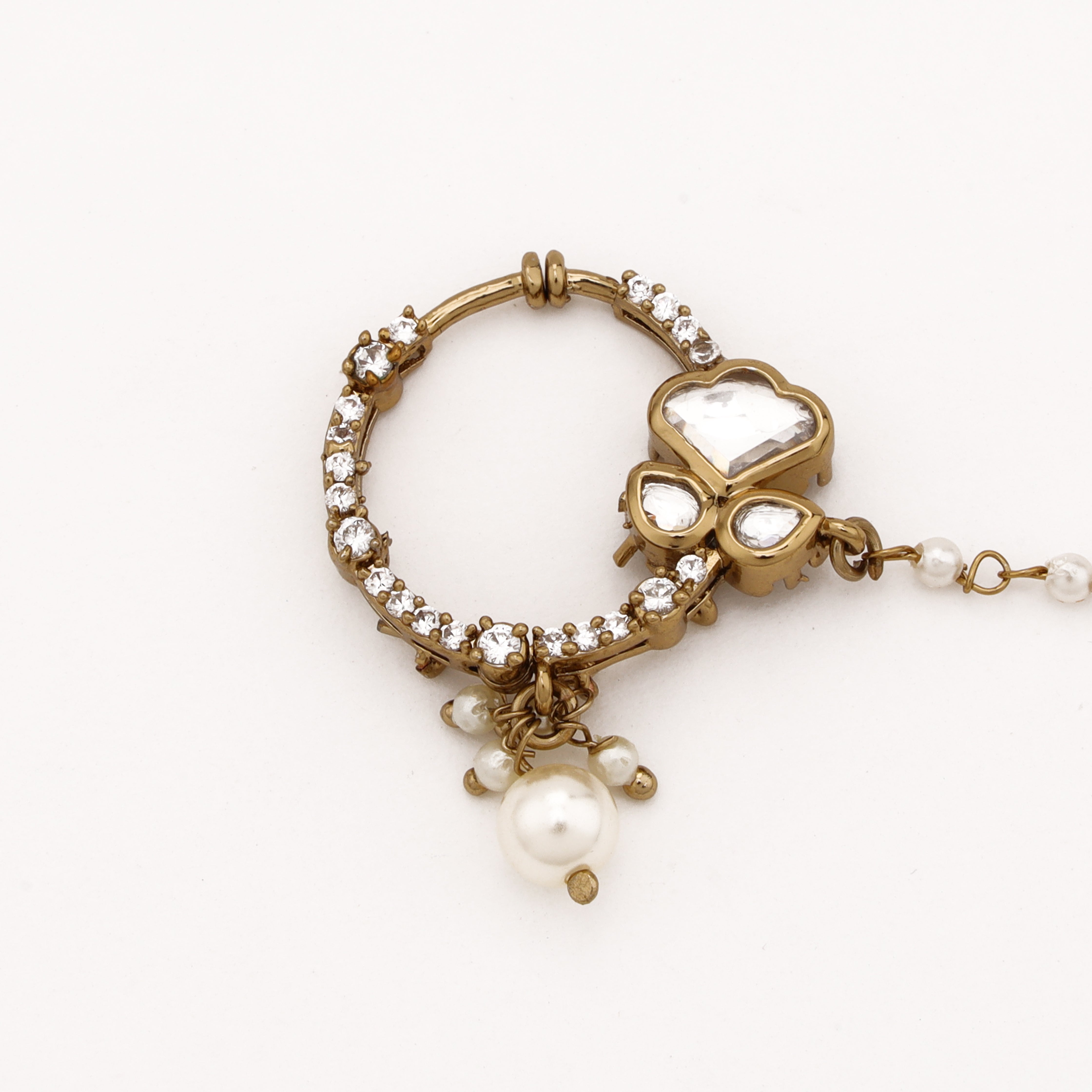 Antique gold Aadhira crest polki pearl nath with white stones, crystal hoop, pearl drop and attached beaded chain from US Catalog